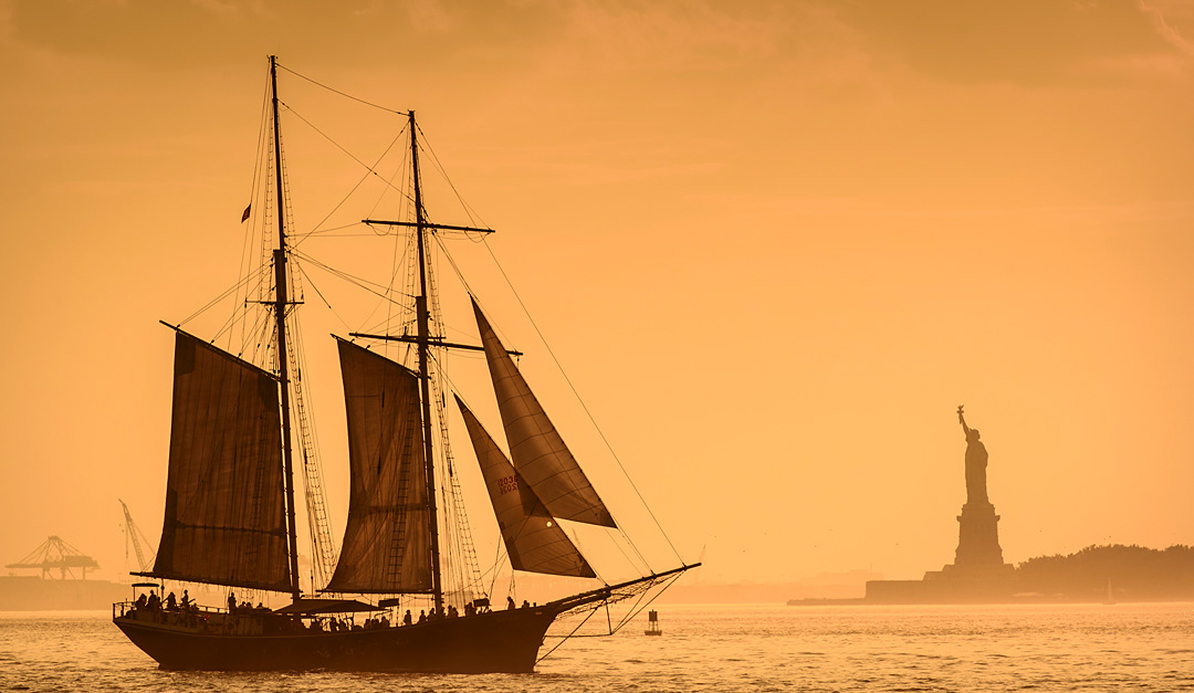 A sailboat near Liberty Island. 