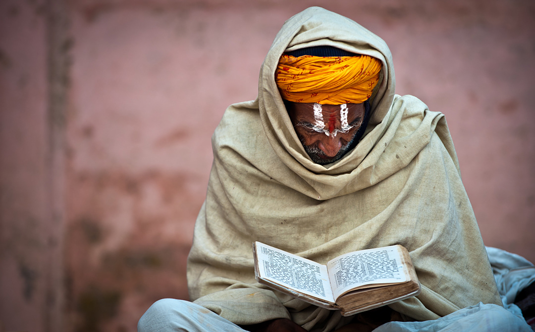 Sadhu reading in the ghats, Varanasi. 