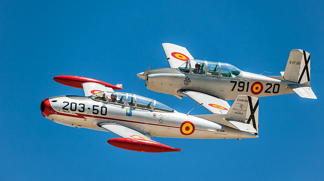 HA-200 Saeta and Beechcraft T34 Mentor of the Fundación Infante de Orleans during an air show at the Cuatro Vientos airfield in September 2012.