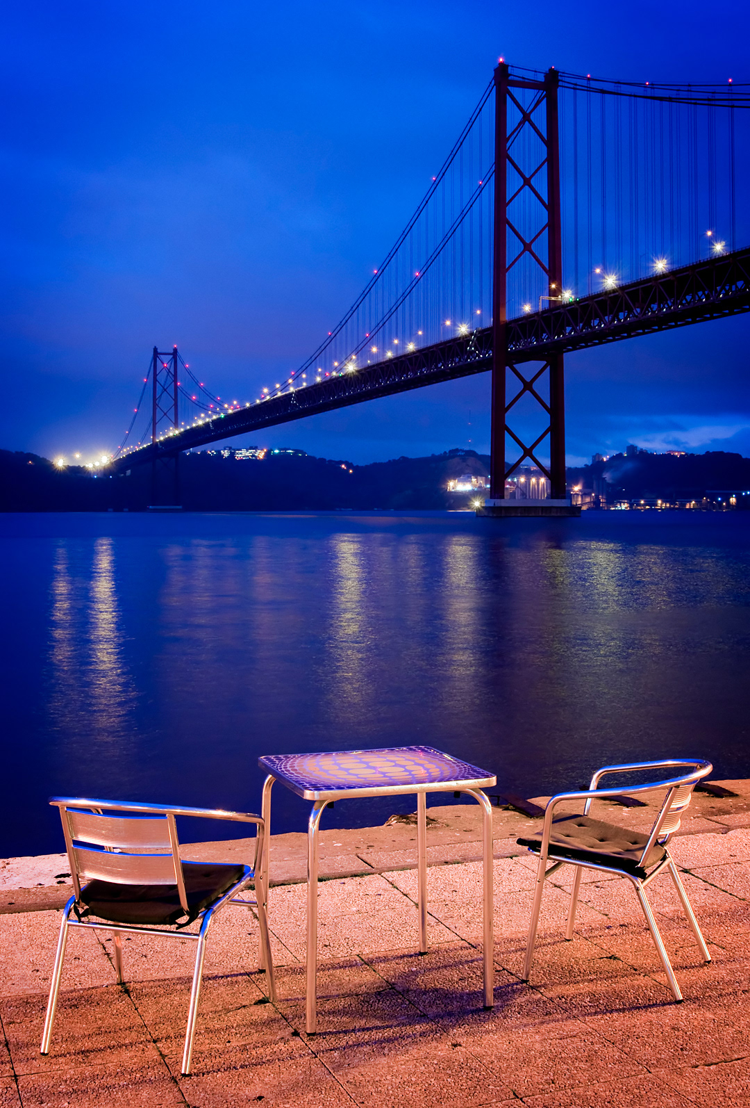 Terrace of a cafe near the 25 de Abril bridge in Lisbon. 