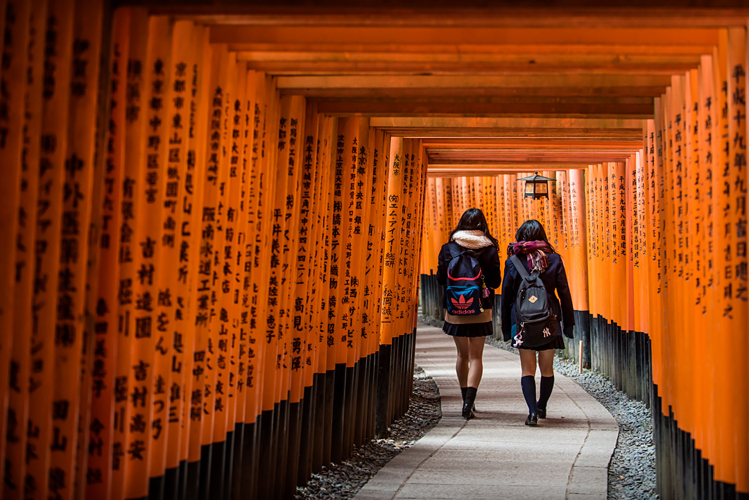 Two girls in Fushimi-Inara temple, Kyoto.