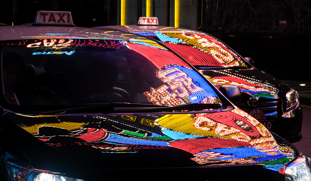 Taxis under the Casino Lisboa (Macau). 