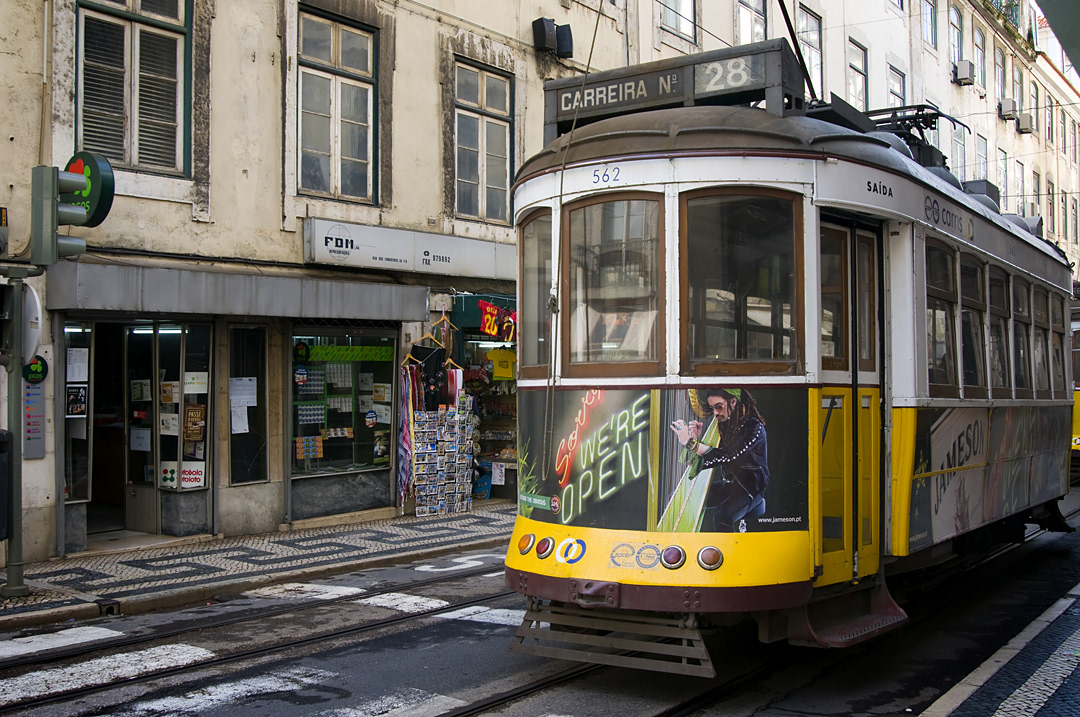 Tram in the streets of Lisbon city centre. 