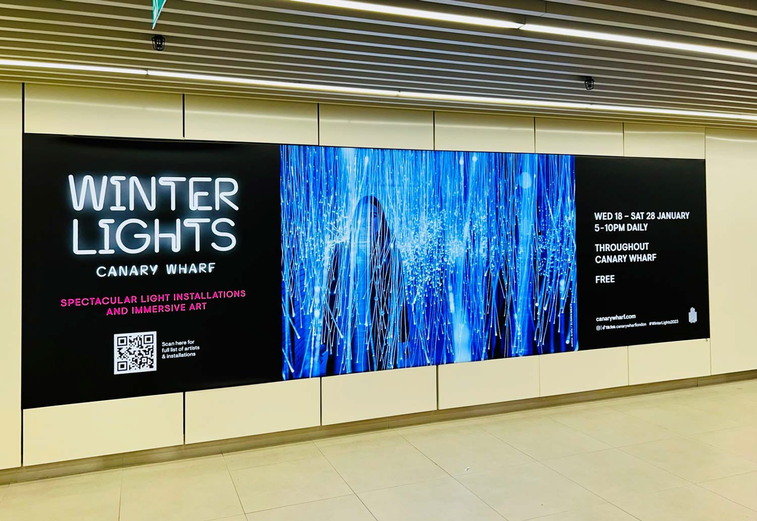 Banner with a visual advertising the upcoming light installation at Winter Lights Canary Wharf.
