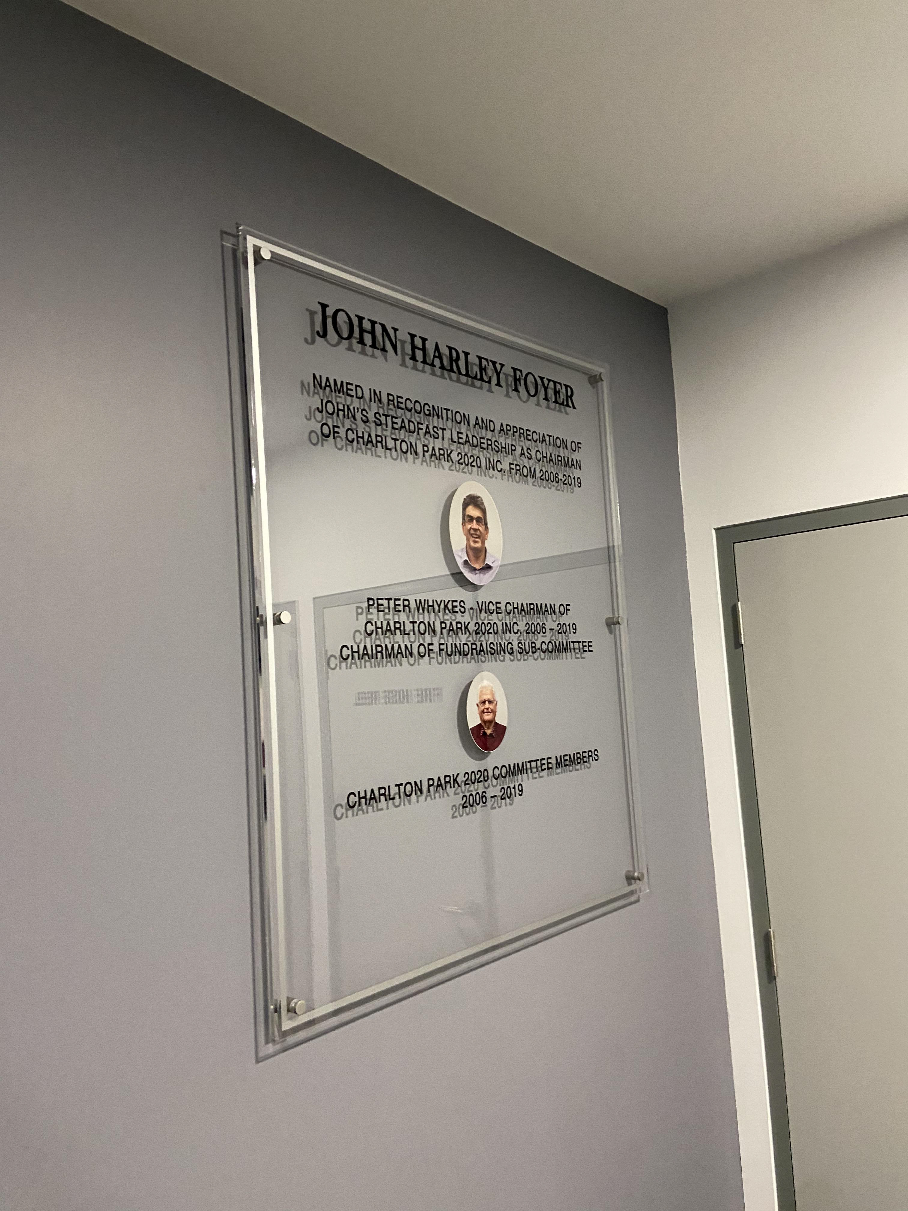 Acrylic sign with aluminium standoff's