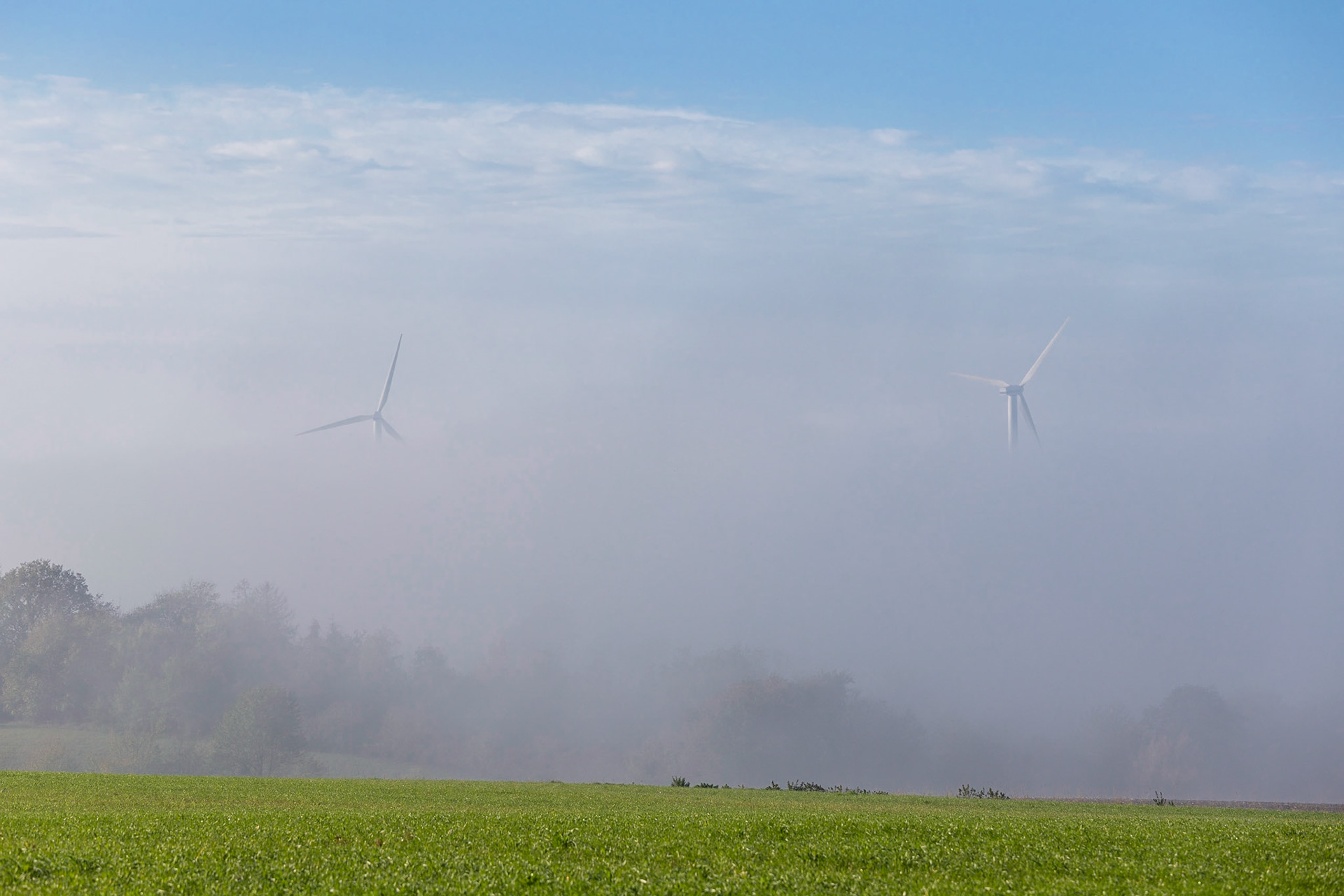 Wind Turbines in the Mist