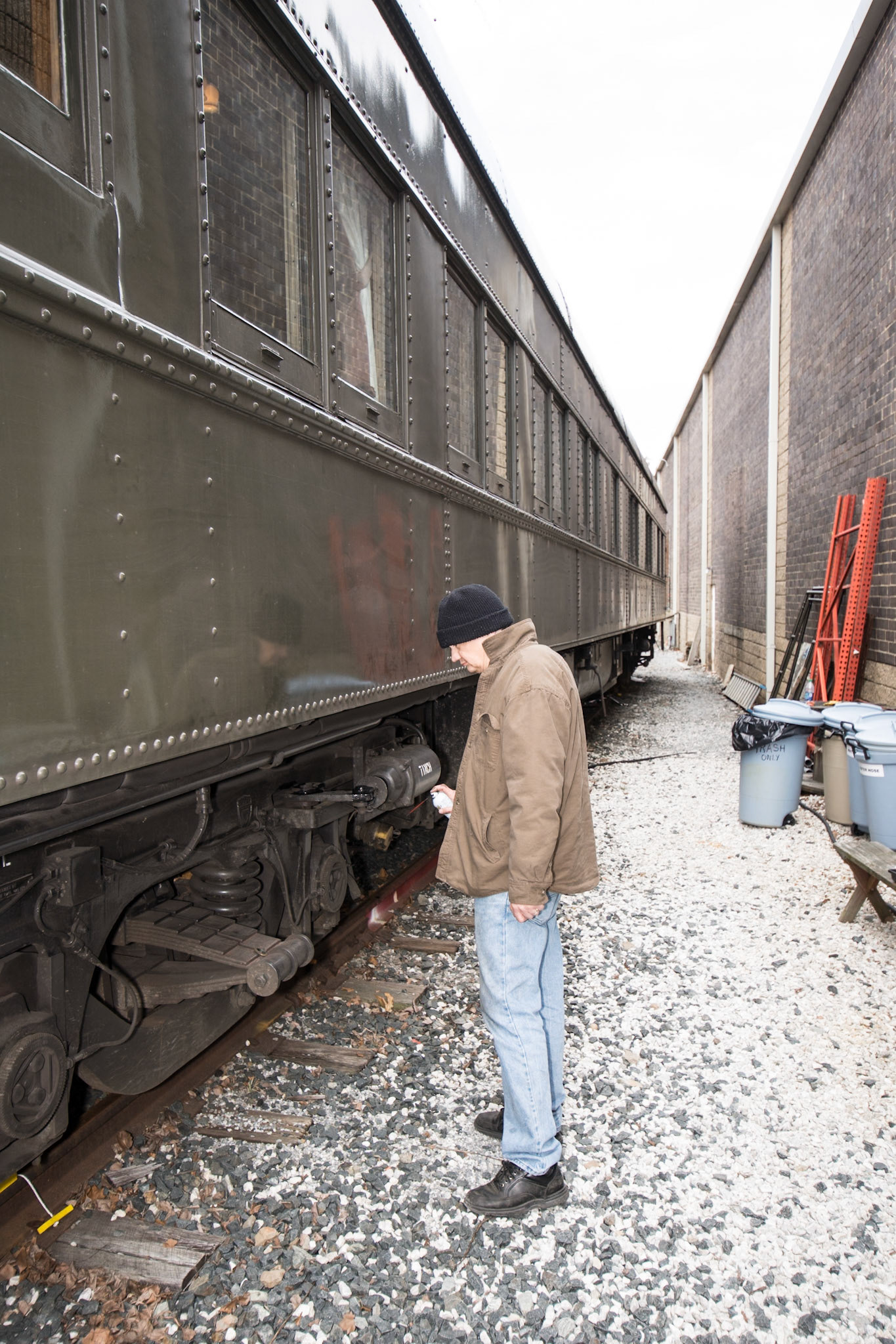 Jim Lilly applying lubricant