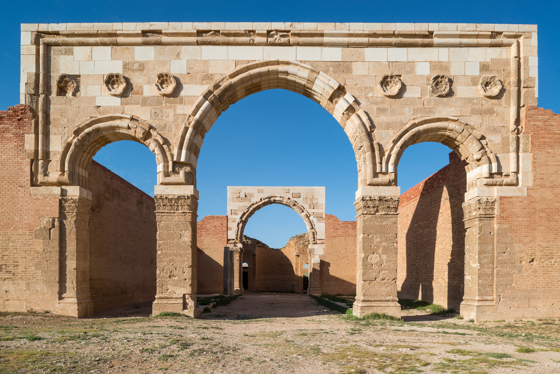Qasr Mshatta, Reconstruction of Triple Arched Facade, Entrance to Columned Hall, Amman, Jordan. Photo: 2016. © The Trustees of Columbia University