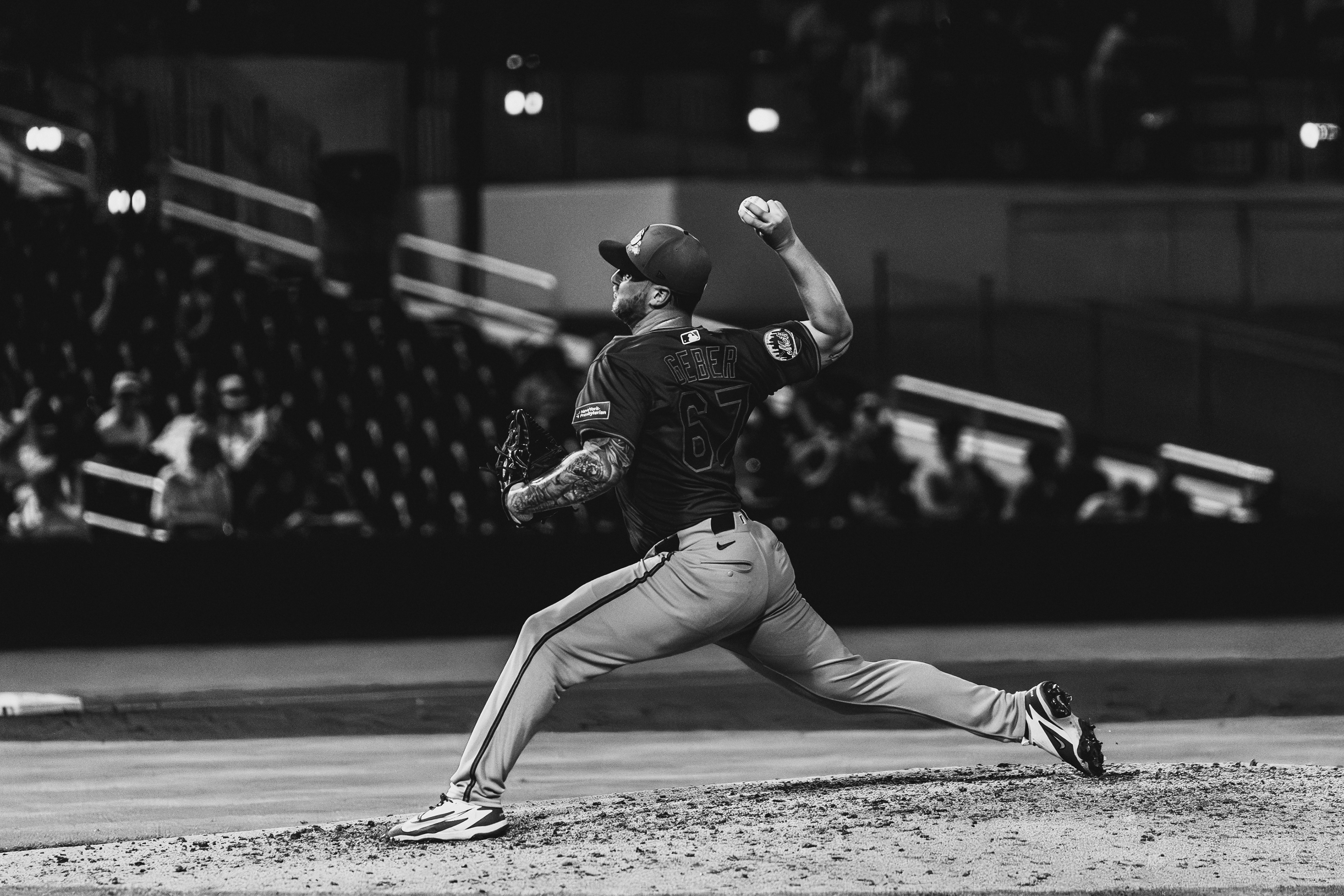 New York Mets pitcher Jordan Geber (67) in full stride on the mound during a spring training game against the Houston Astros at The Ballpark of the Palm Beaches, March 2026. Black and white edit. Photo by Aday's Media Production