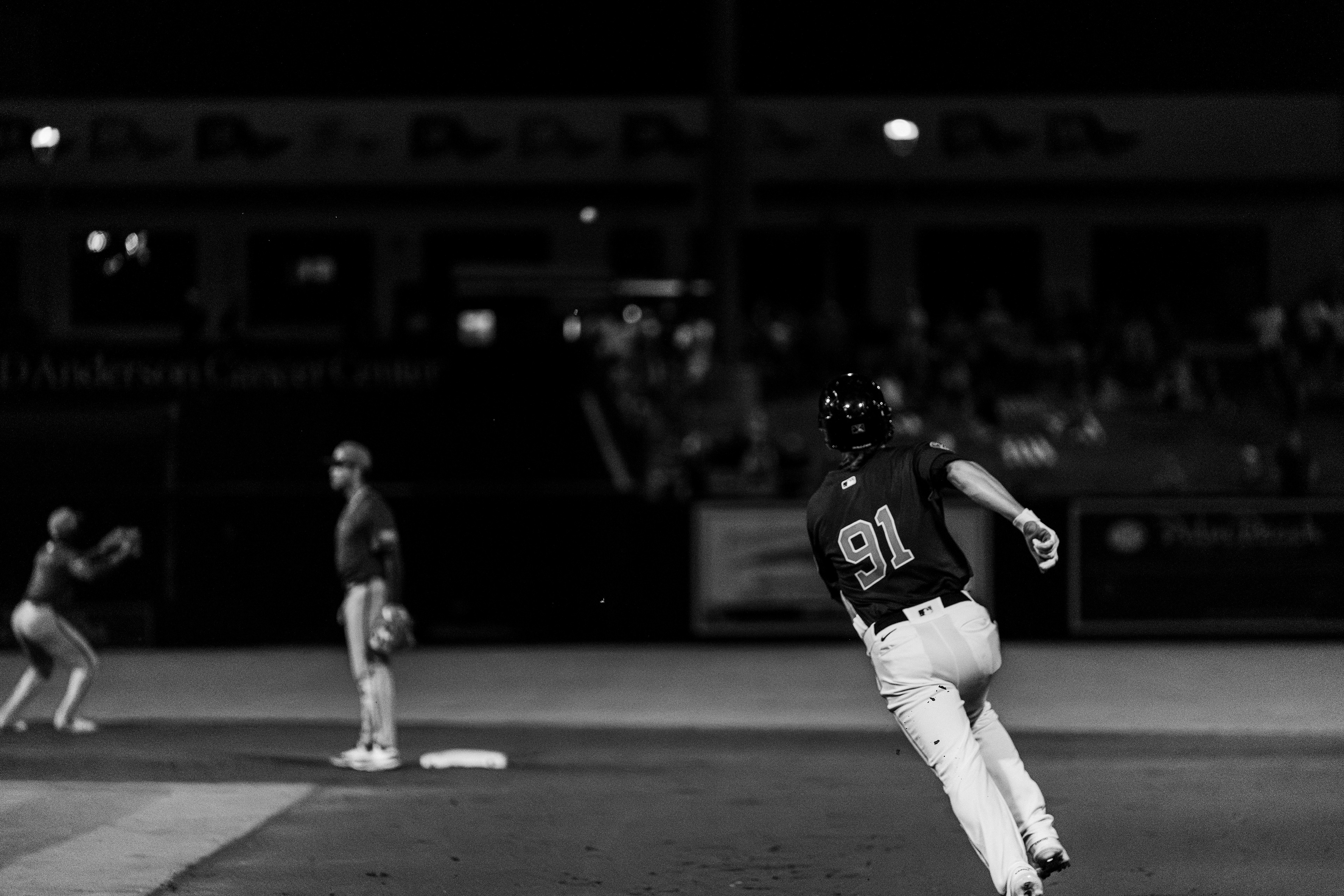 Houston Astros number 91 runs the bases during a spring training game against the New York Mets at The Ballpark of the Palm Beaches, March 2026. Black and white edit. Photo by Aday's Media Production