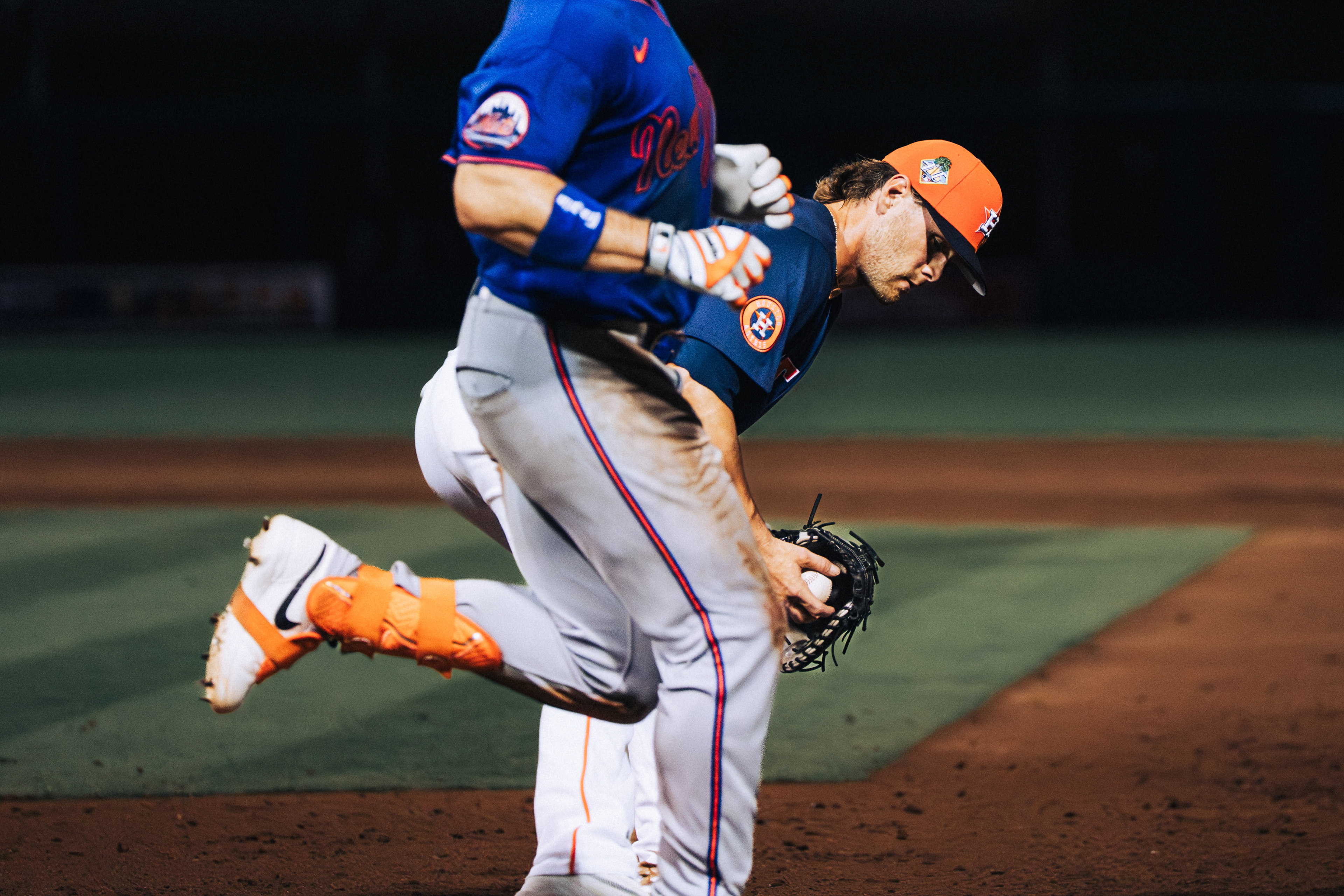 Houston Astros first baseman fields the ball at first base as a New York Mets runner crosses the bag during spring training at The Ballpark of the Palm Beaches, March 2026. Photo by Aday's Media Production