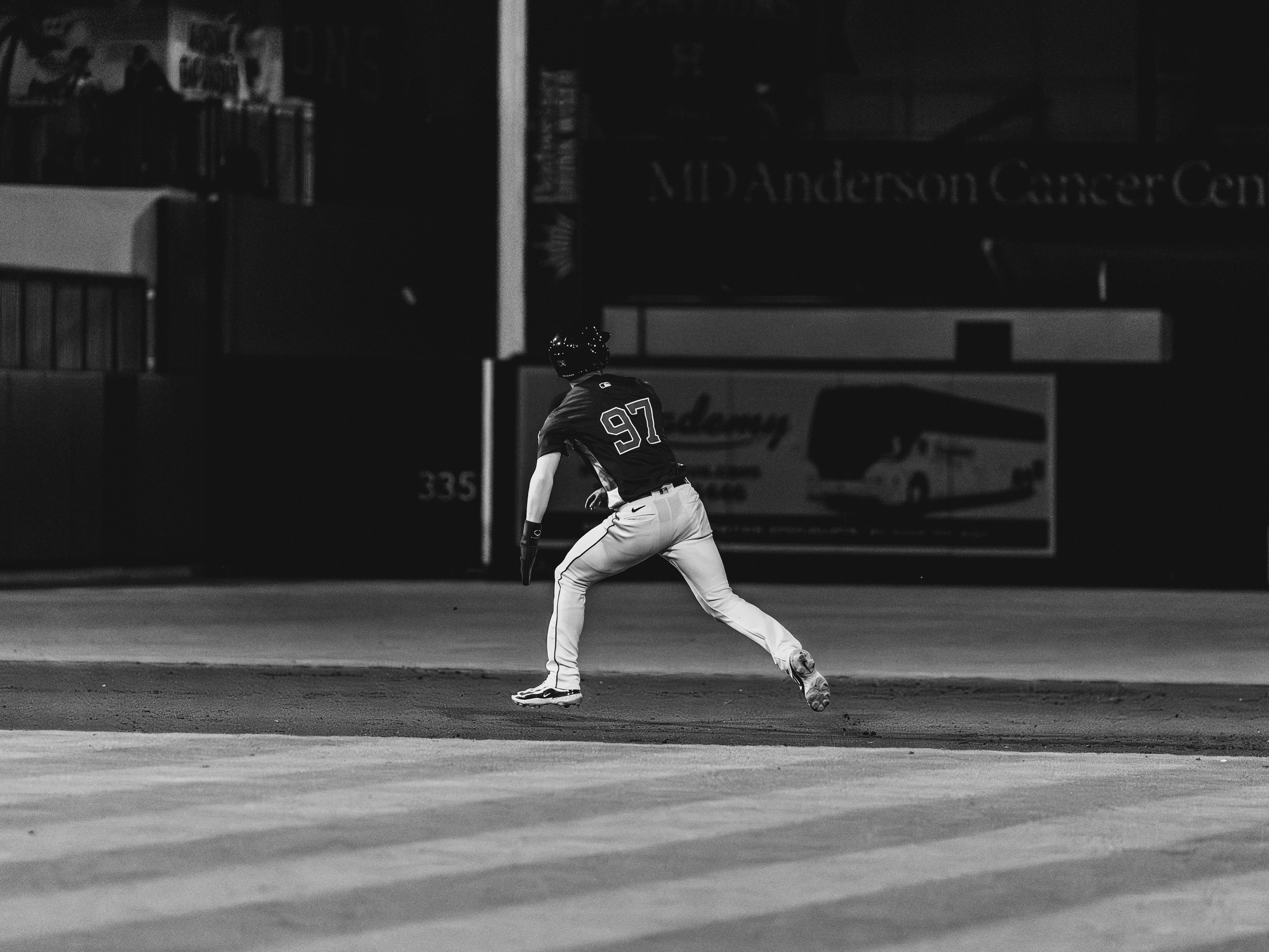 Houston Astros number 97 sprints along the basepath during a spring training game against the New York Mets at The Ballpark of the Palm Beaches, March 2026. Black and white edit. Photo by Aday's Media Production
