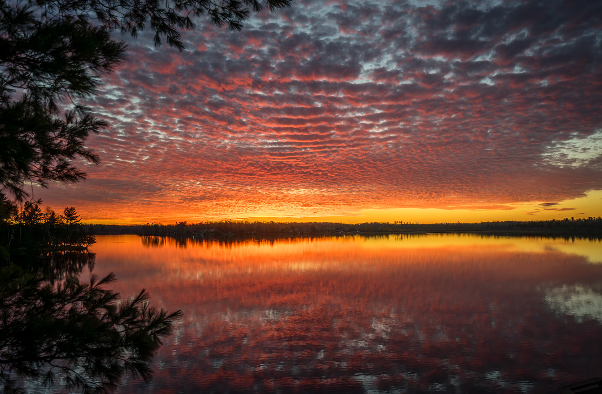 October 20 - Sunset Reflections With the peak leaf color season now over and leaves blown away by wind and rain, mid-October's long, colorful sunsets seem more brilliant than ever.Even though the colors fade from the landscape and dark days lay ahead, there is hope in the brief period of light and color mixed in the sky at sunrise and sunset.So that those who dwell at the ends of the earth are in awe of your signs. You make the going out of the morning and the evening to shout for joy. Psalm 65:8