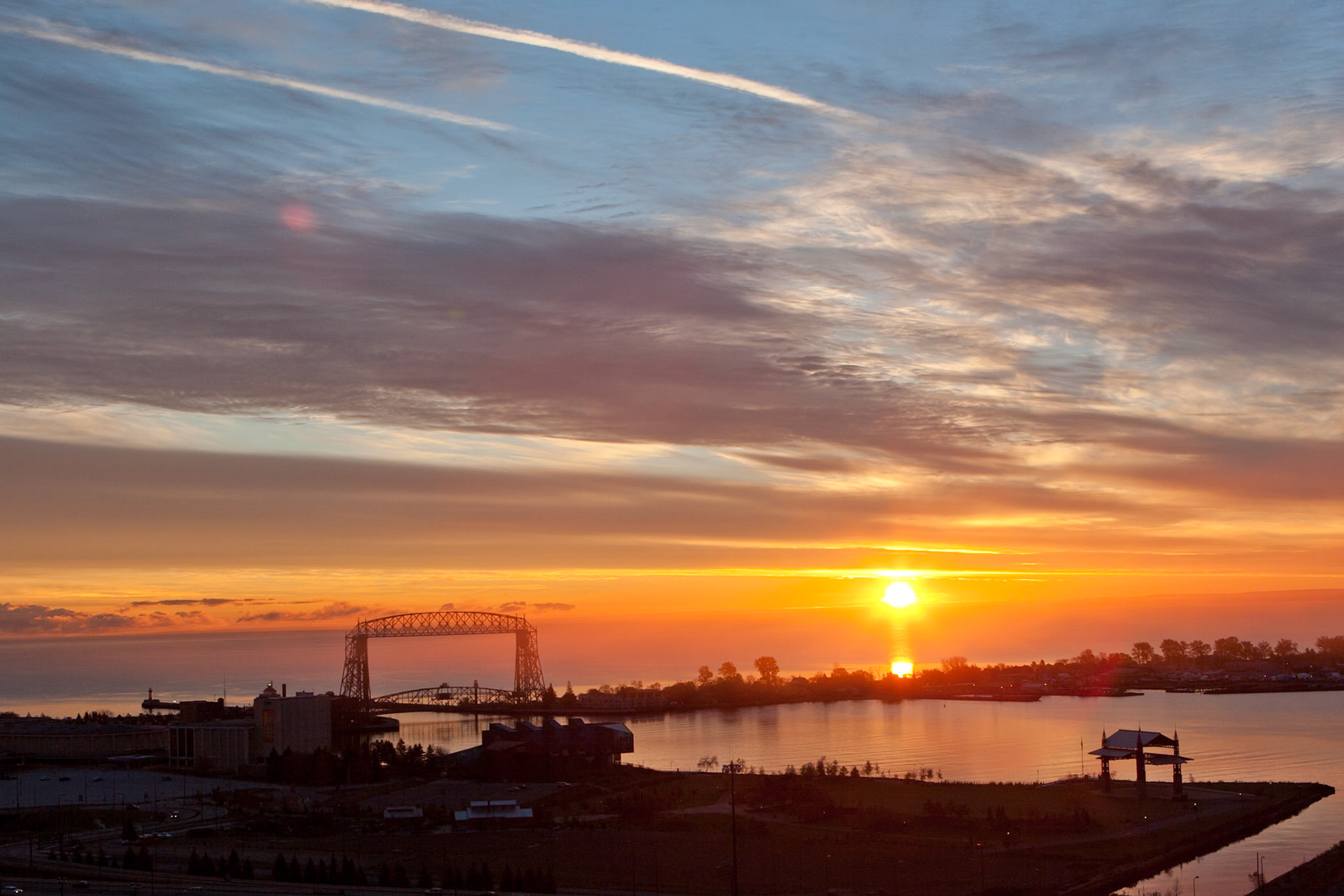 An October Sunrise sheds light onto a quiet lake.