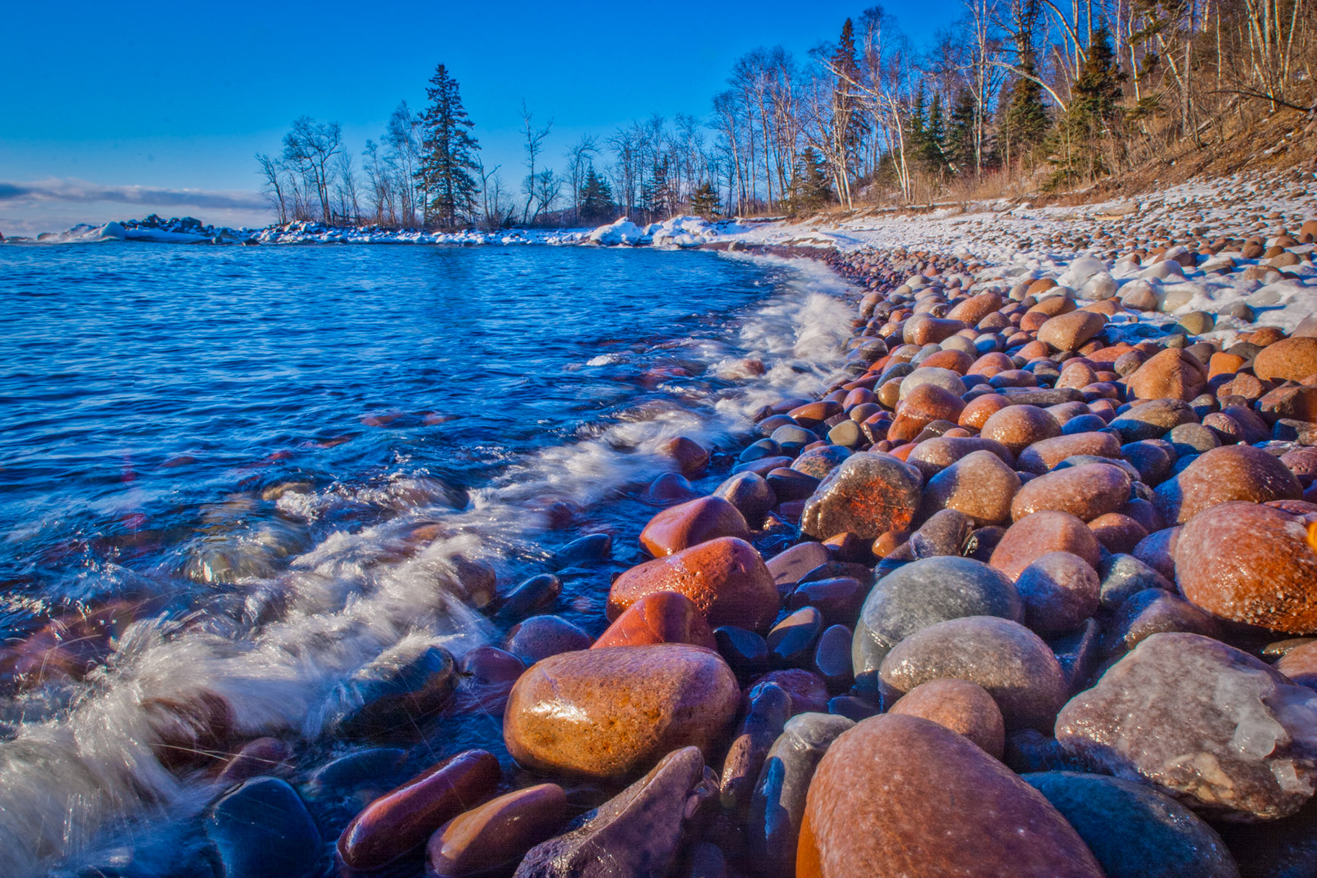 November 9 - Fresh November MorningThe rocky shoreline of Tettegouche State Park perfectly displays the multi-colored rounded boulders and the icy clear water of Lake Superior.The beauty of nature is unmatched and can leave a lasting impression on our minds. The crisp air of a fresh November morning and the breathtaking scenery of Tettegouche State Park provides a sense of tranquility and calmness. The Lord is my shepherd; I shall not want.  He makes me lie down in green pastures. He leads me beside still waters.   He restores my soul.  23:1-2