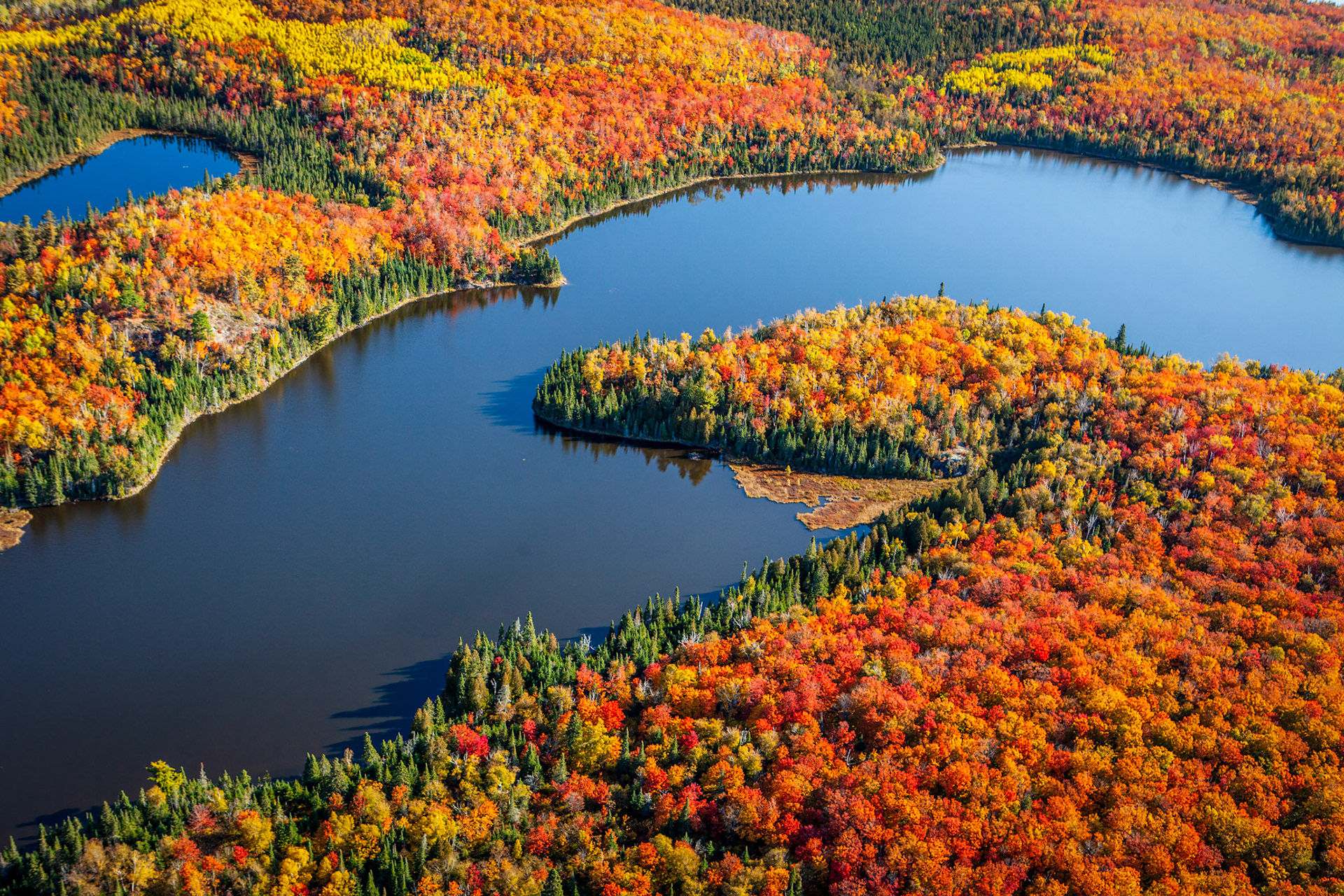 September 27 - Autumn Splendor - The beauty of the autumn season is upon the northland, and the brilliant, crisp colors of the forest foliage are on full display. This scene of the inland tapestry around Grand Marais, Minnesota, only leads to one word - WOW!It is hard to believe that the colors will soon be gone in only a few short weeks, and a winter white blanket will cover the landscape.Autumn is a time of reflection, rest, and thankfulness. It reminds us that life is short and to get things in order.The Goodness of God"For you shall go out in joy and be led forth in peace; the mountains and the hills before you shall break forth into singing, and all the trees of the field shall clap their hands." Isaiah 55:12