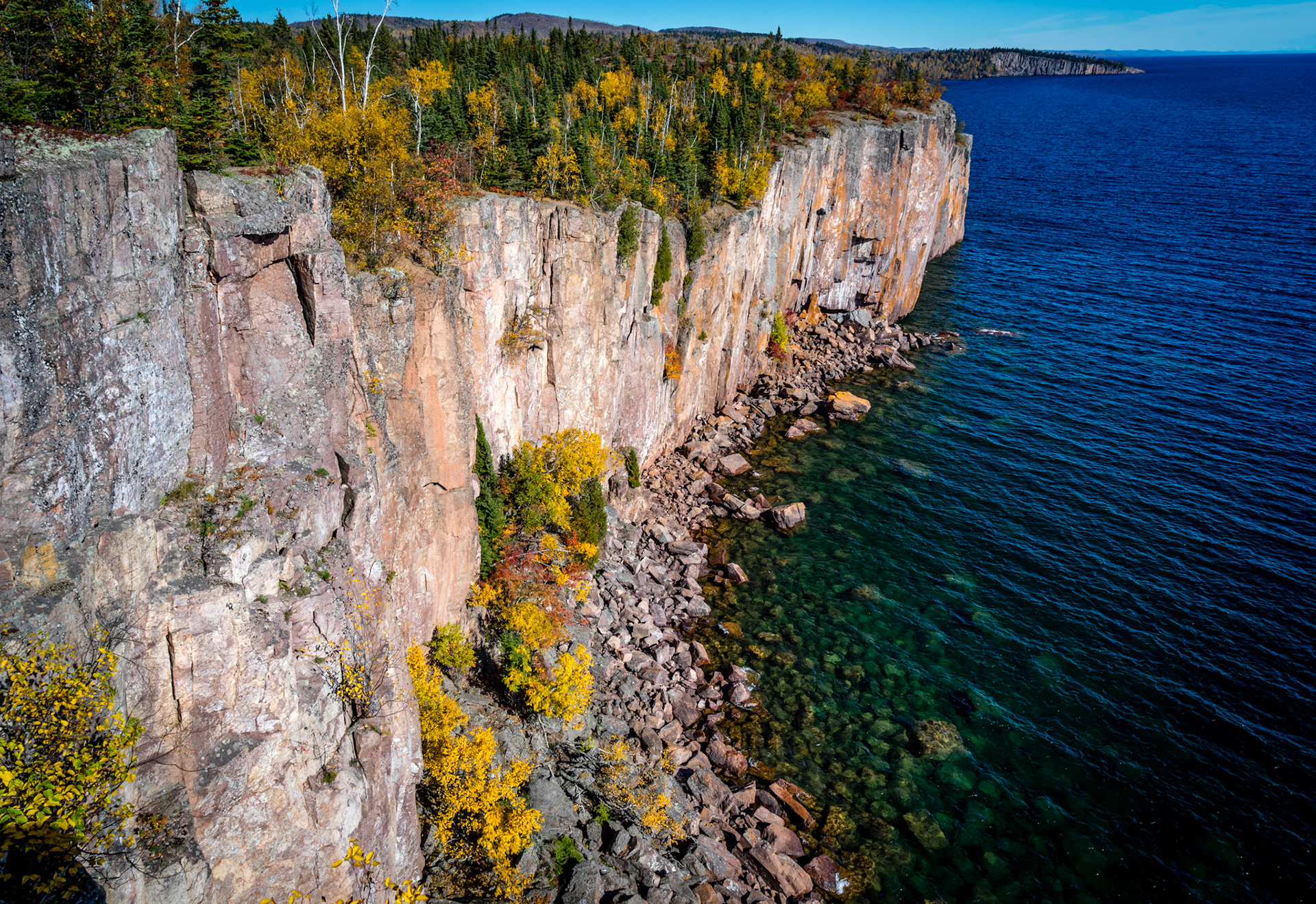 October 14 - October at Palisade Head - Palisade Head is a little-known rock outcrop near Silver Bay, Minnesota, representing the typical beauty of the North Shore of Lake Superior. The stunning vista from this nearly 1000-foot sheer rock cliff displays the beauty of the Northland in any season, especially autumn. Located near Silver Bay, Minnesota, Palisade Head is a must-see for anyone venturing up the north shore of Lake Superior.Hear my cry, O God, listen to my prayer; from the end of the earth, I call to you when my heart is faint. Lead me to the rock that is higher than I, for you have been my refuge, a strong tower against the enemy. Psalm 61:1-3