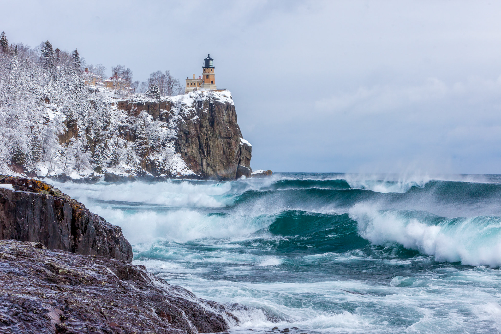 April 20 - Stormy WatersLake Superior waves roll onto the shoreline at Split Rock Lighthouse.It's common to experience such events during March and April's constantly shifting weather conditions. Observing these powerful conditions is a joy not only for photographers but also for travelers.He who dwells in the shelter of the Most High will abide in the shadow of the Almighty. I will say to the Lord, "My refuge and my fortress, my God, in whom I trust." Psalm 91:1-2God is with us in the storms of life, providing comfort to the weary.