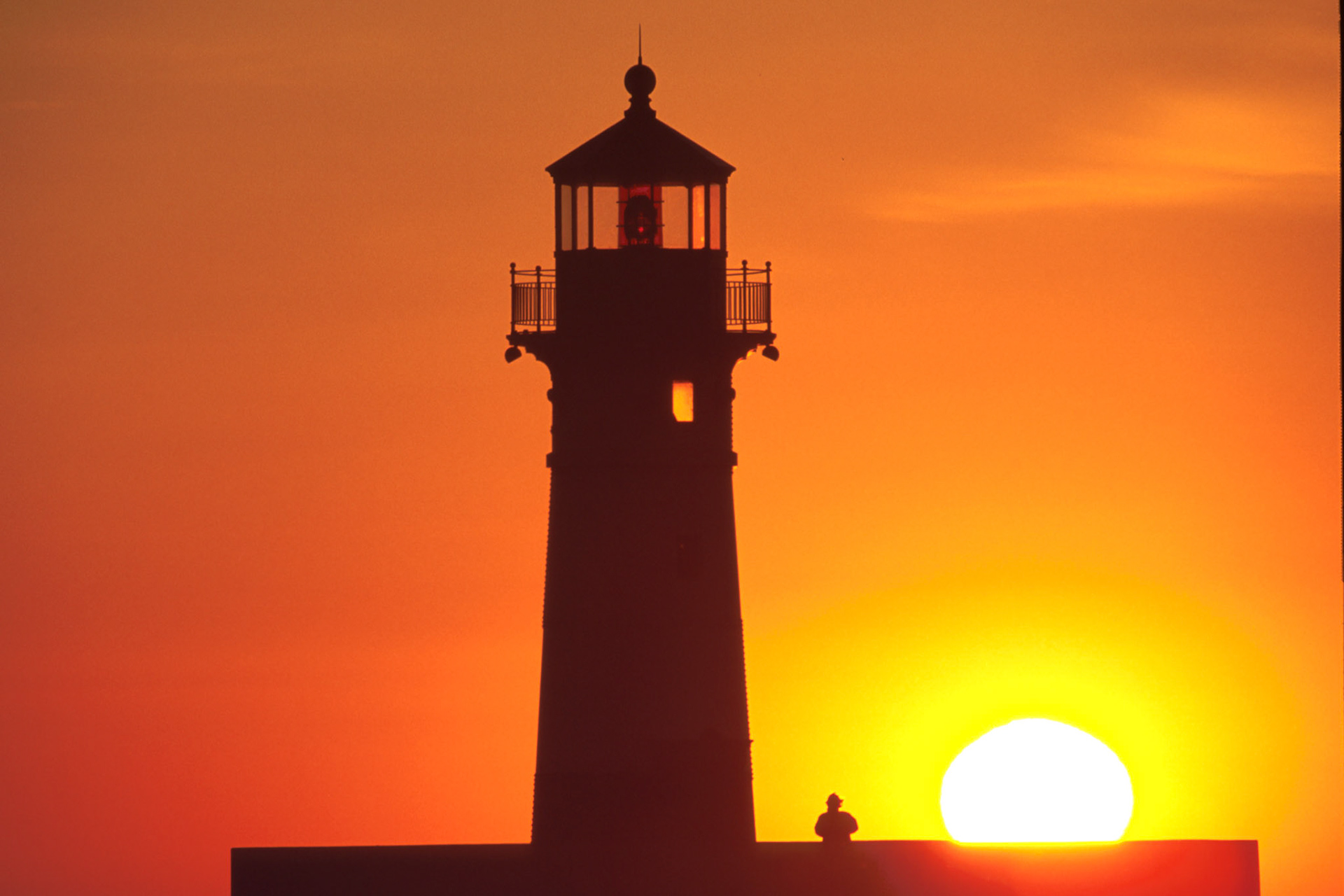 October 21 - Morning WatchA lone onlooker captured the incredible wonder of another sunrise over Lake Superior.  So what motivated this person to get out of bed, drive to the canal, and walk out onto the pier on a cool October morning to observe an event that happens every day? Whatever it was, I'm sure his day started better than otherwise.Wherever you are, take a minute to view a sunrise or sunset and count your blessings; there may be more than you think.My soul waits for the Lord more than watchmen for the morning, more than watchmen for the morning. Psalm 130:6
