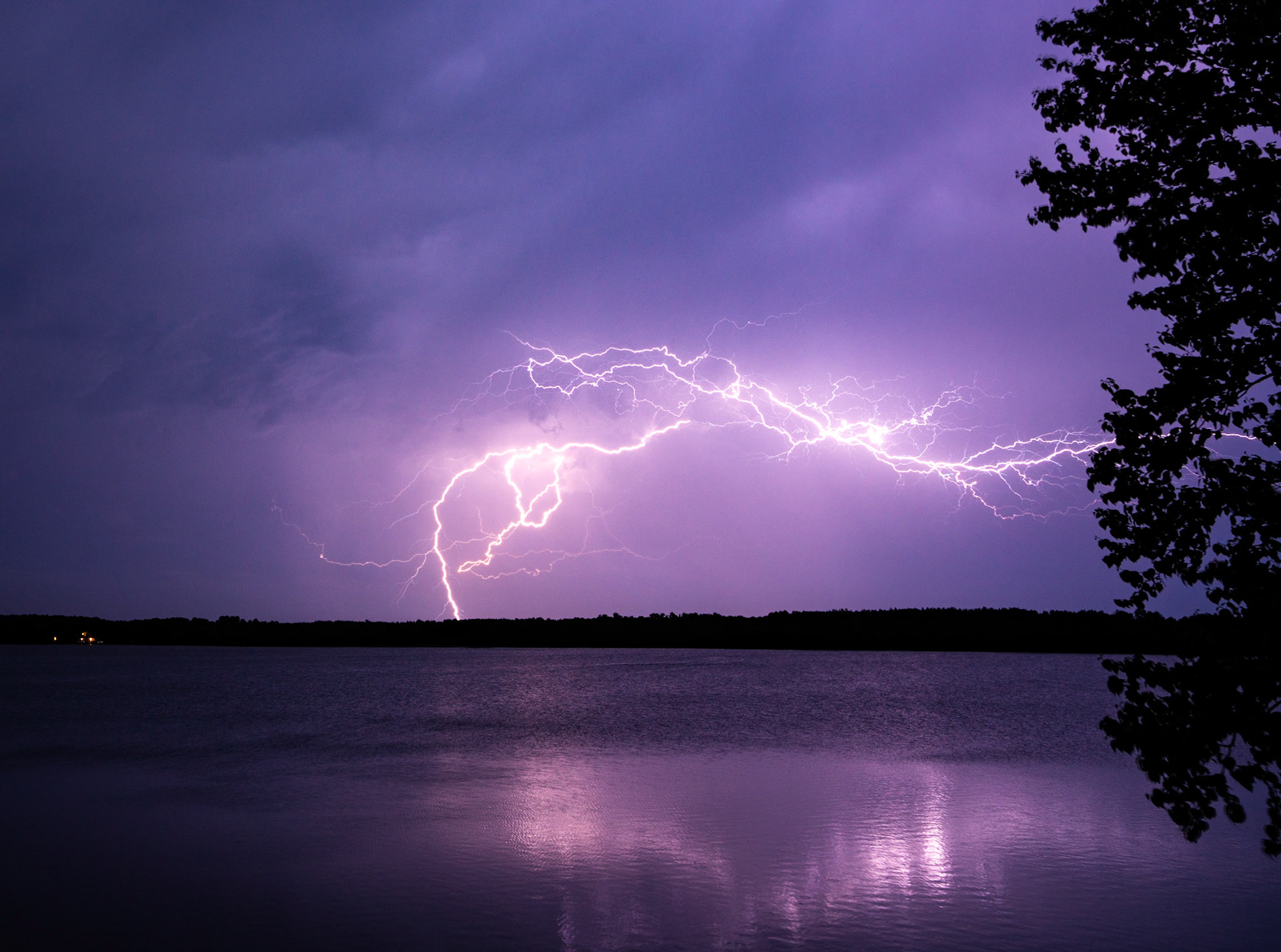 July 17 - Pure Power - Lightning is one of the powerful forces on earth, an incredible display of God's glory.This storm rolled across the Northland on a warm July night. The resident fireflies also added to the light show.It is He who made the earth by His power,Who established the world by His wisdom;And by His understanding, He has stretched out the heavens.When He utters His voice, there is a tumult of waters in the heavens,And He causes the clouds to ascend from the end of the earth;He makes lightning for the rain,And brings out the wind from His storehouses. Jeremiah 10:12-13