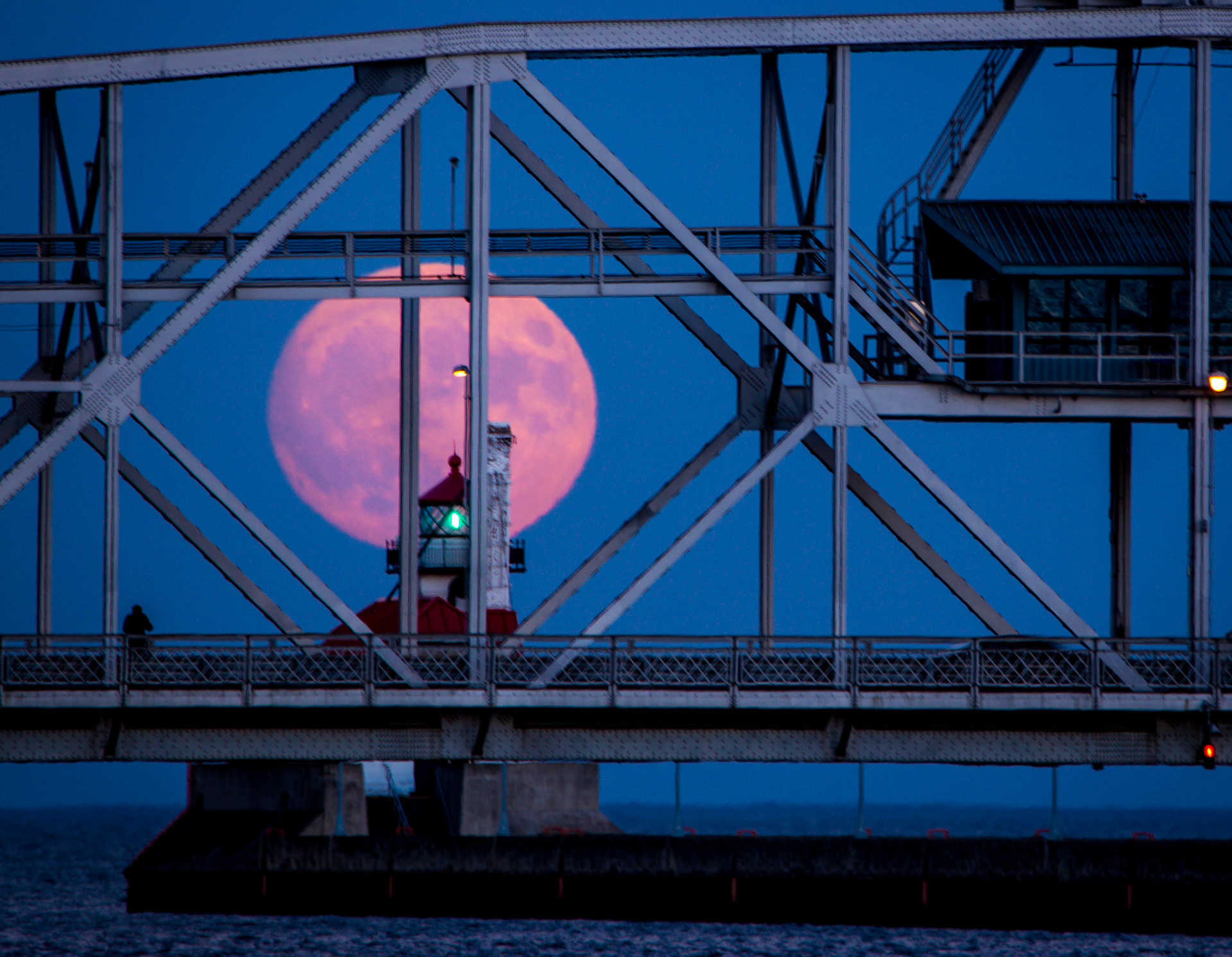 November 13 - Super MoonThis month's Super Moon rises from behind the South Pier Lighthouse, appearing 16% larger than typical full moons. It is an incredible sight to behold on a warm November evening.He made the moon to mark the seasons; the sun knows its time for setting. Psalm 104:19