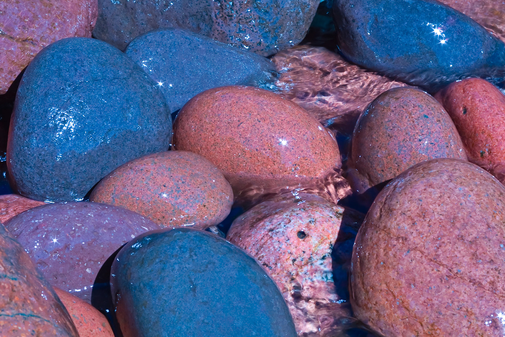 September 26 - Lake Superior Stones - Lake Superior's waves, sand, and rocky shoreline act like a giant rock tumbler to round and polish stones of many sizes before being deposited along the coastline. These rocks range in size from one to 25 pounds and have been banging against each other on the lake floor for many years. In this scene, the multicolored boulders grace the shore of Tettegouche State Park near Silver Bay, Minnesota, and make for an incredible display of the artistry and craftsmanship of the Hand of God.The Strength of GodI love you, O LORD, my strength. The LORD is my rock, my fortress, and my deliverer; my God is my rock, in whom I take refuge. He is my shield and the horn of my salvation, my stronghold. Psalm 18