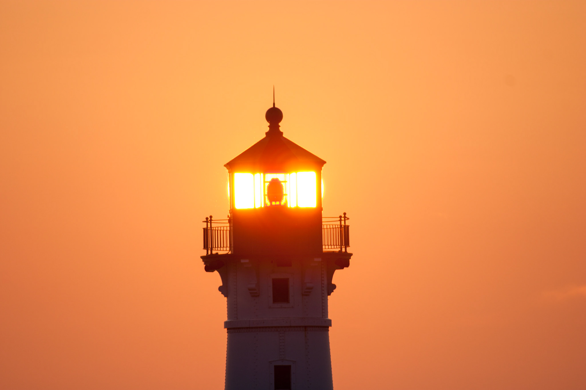 August 10th - Lights - sunshine pours through the lens of the North Pier Lighthouse in Duluth. Catching a Lake Superior sunrise is a peaceful and soul-filling experience, much like reading God's Word - The Bible.You, LORD, keep my lamp burning; my God turns my darkness into light. Psalm 18:28