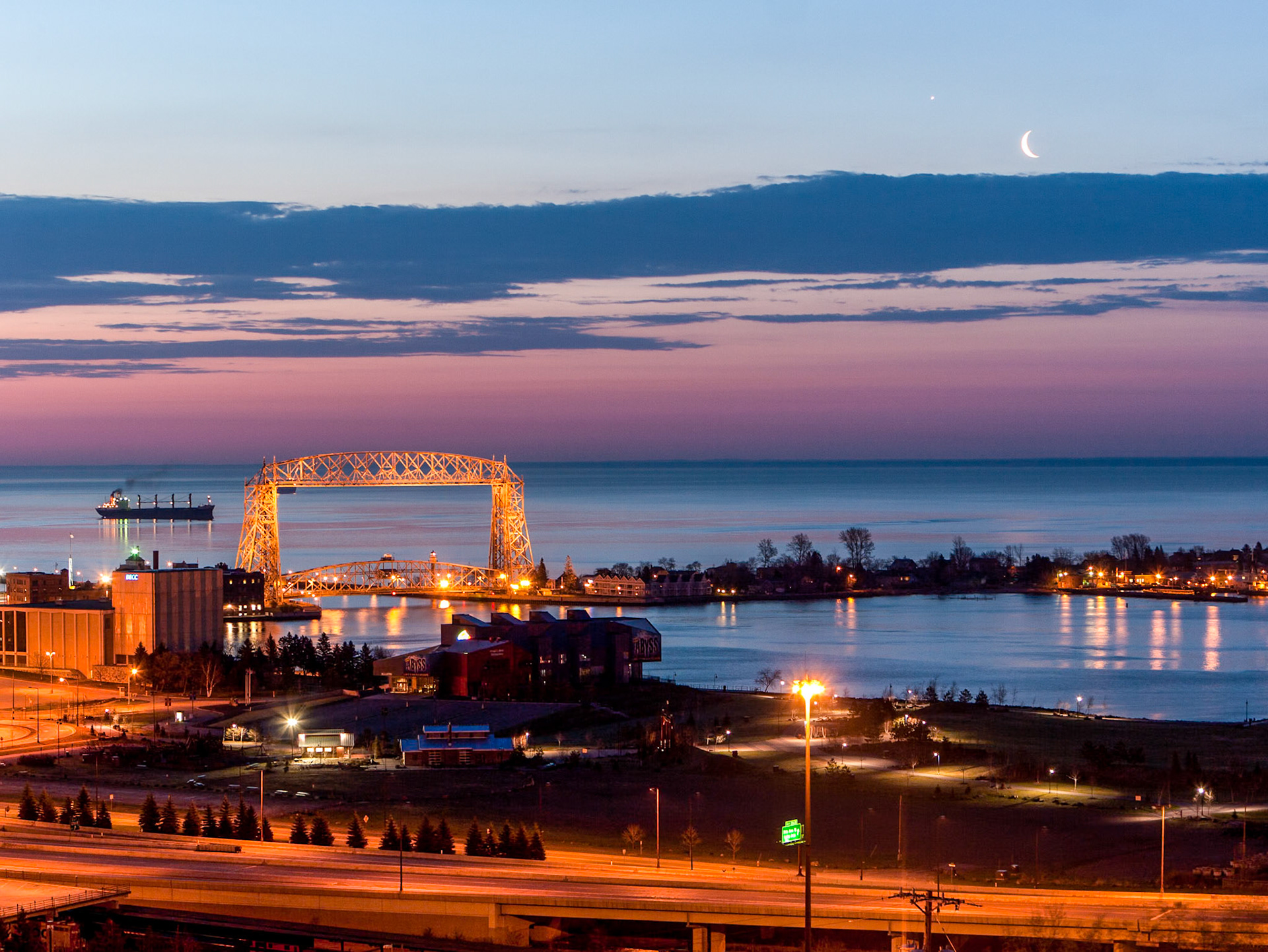 A cescent moon quietly glows over the city of Duluth while few residents are yet awake to enjoy it.