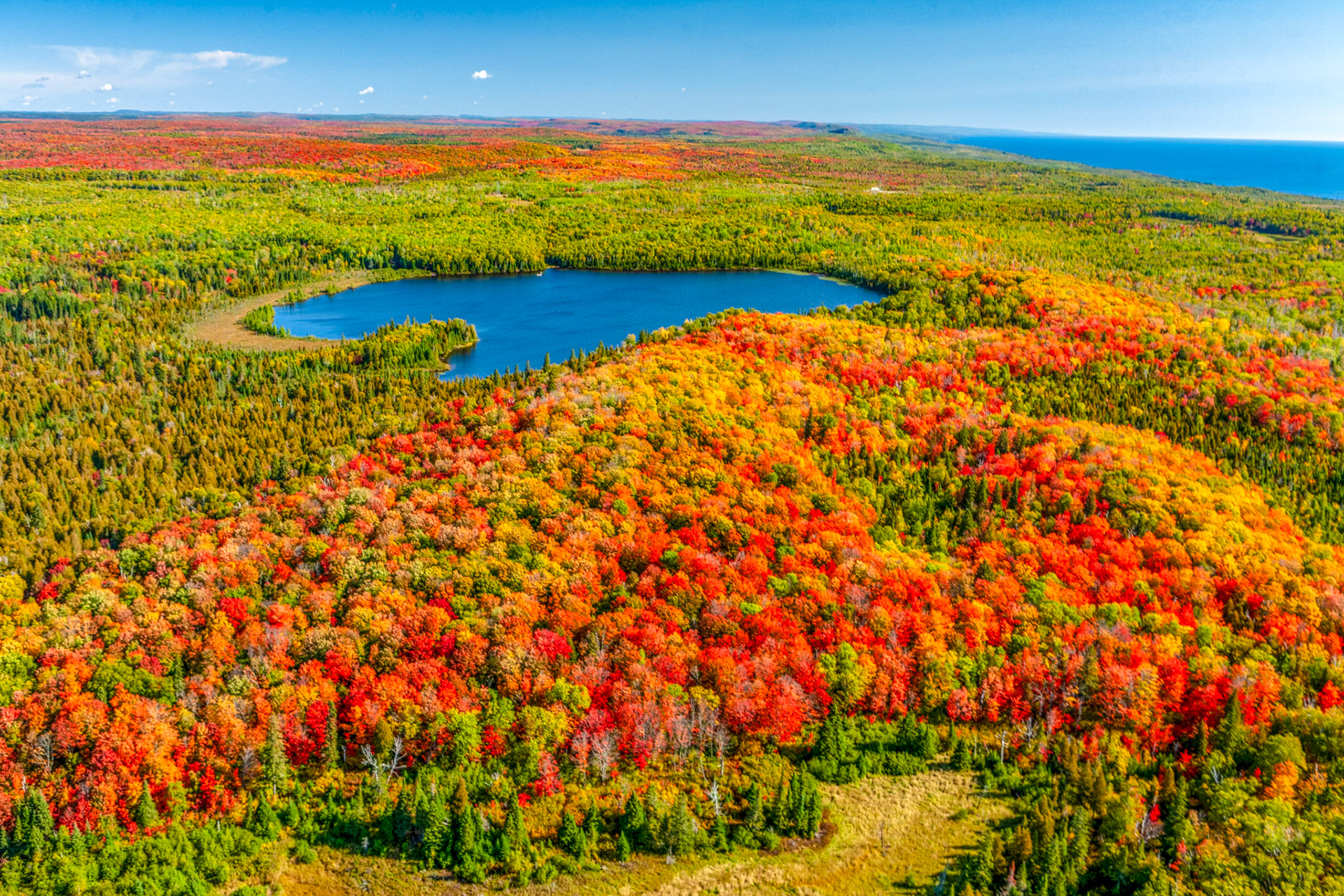 September 24 - Colored Carpet - Entering the last week of September, the inland forest ridges are nearing peak fall colors and are stunning to see, especially from the air.The brilliant colors have been in the leaves since they first popped out last May; however, the chlorophyll breaks down because of the loss of daylight hours and rapidly cooling temperatures, and the green color disappears. Instead, the yellow to orange colors become visible, giving the leaves their fall color.The breathtaking autumn colors are the grand finale of a season of growth and help to make us aware that a season of rest will soon come upon the landscape.Seasons - A Time for EverythingFor everything, there is a season and a time for every matter under heaven:a time to be born, and a time to die;a time to plant, and a time to pluck up what is planted; a time to kill, and a time to heal;a time to break down, and a time to build up; a time to weep, and a time to laugh;a time to mourn, and a time to dance; a time to cast away stones, and a time to gather stones together;a time to embrace, and a time to refrain from embracing;a time to seek, and a time to lose;a time to keep, and a time to cast away; a time to tear, and a time to sew;a time to keep silent, and a time to speak;a time to love, and a time to hate;a time for war and a time for peace.   Ecclesiastes 3The Beauty of God in CreationLift your eyes on high and see: who created these? He who brings out their host by number, calling them all by name, by the greatness of his might, and because he is strong in power not one is missing. Isaiah 40:26