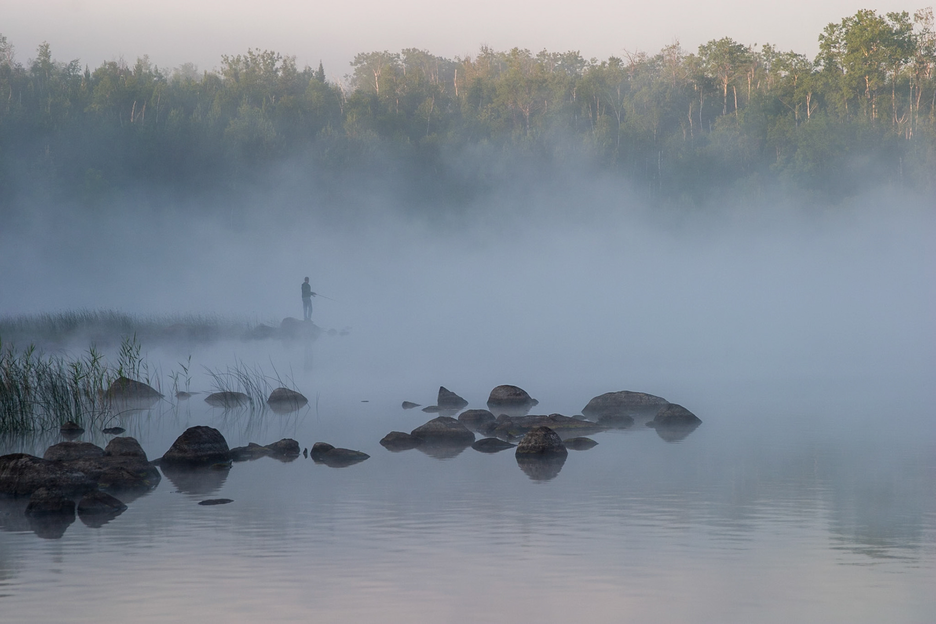 Steam rises off the warm waters of Fall Lake in the Baundary Waters Canoe Area.