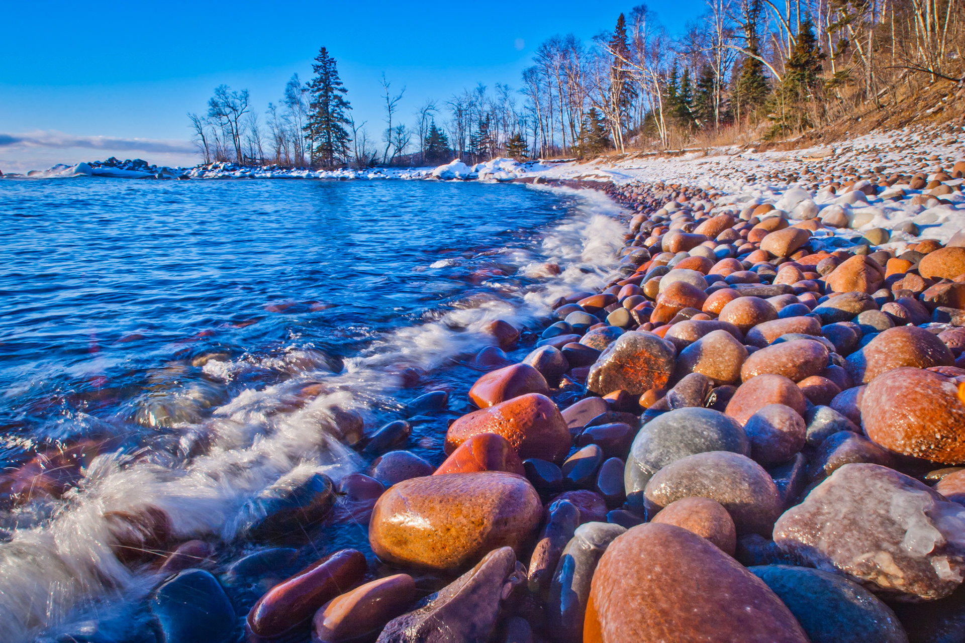 December 23 - Winter ShorelineThe rocky shoreline of Tettegouche State Park is a great place to visit any season of the year, but winter has characteristics that are very beautiful indeed.He makes me lie down in green pastures. He leads me beside still waters. Psalm 23:2