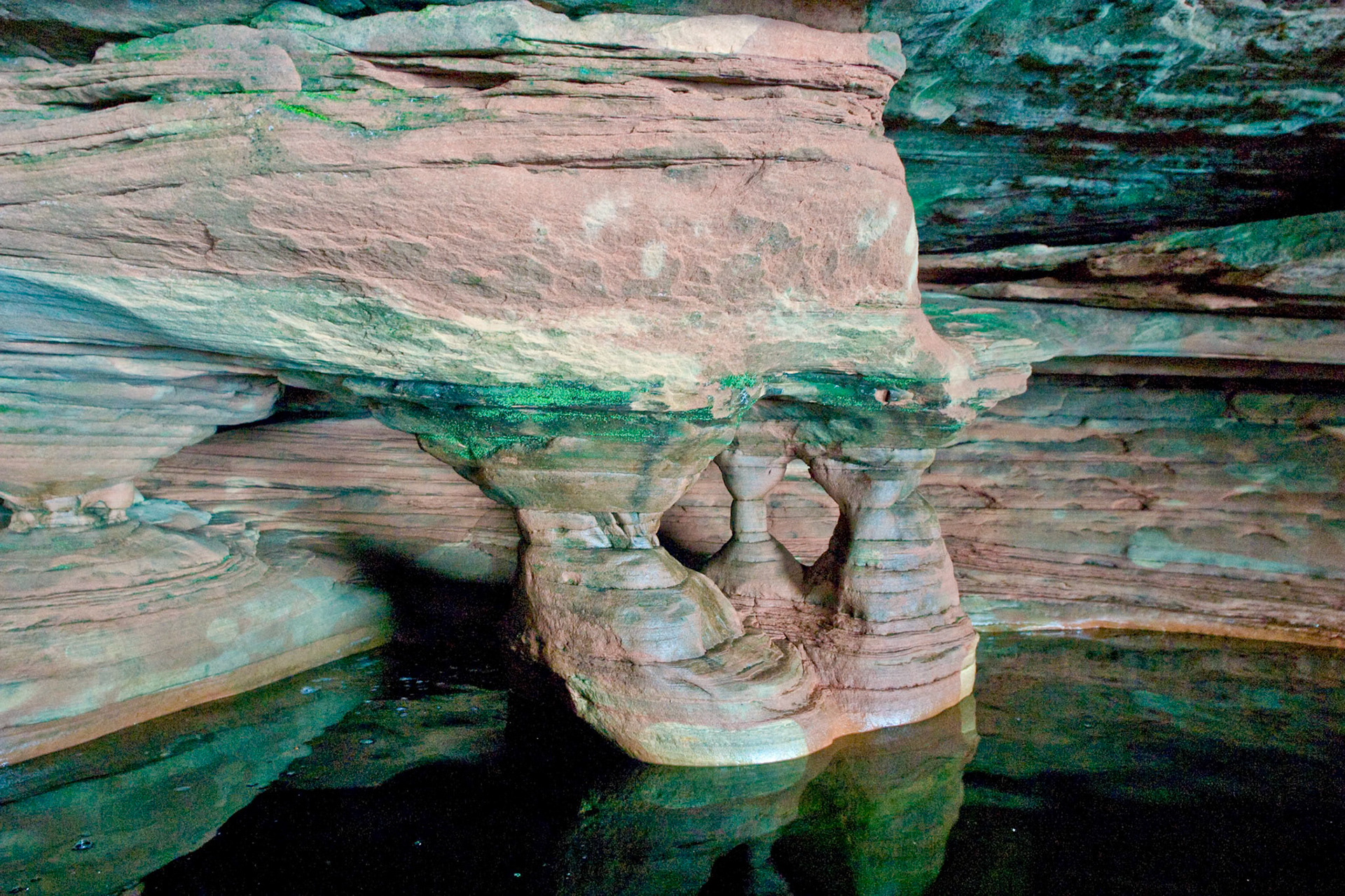 The Apostle Islands sit just off shore from the Bayfield Peninsula on Lake Superior. Erosion of the sandstone has carved out sea caves which can be visited by boat during the summer, and on skies during colder winters. The caves are one of the wonders of the region and give new meaning to "Heaven on Earth".