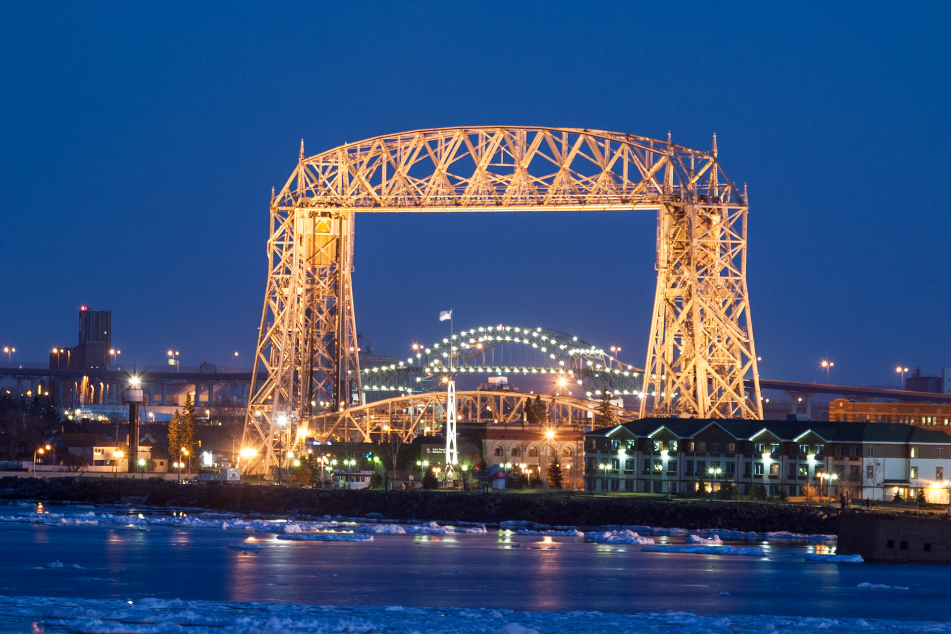 The Blatnik Bridge is framed by the Aerial Lift Bridge