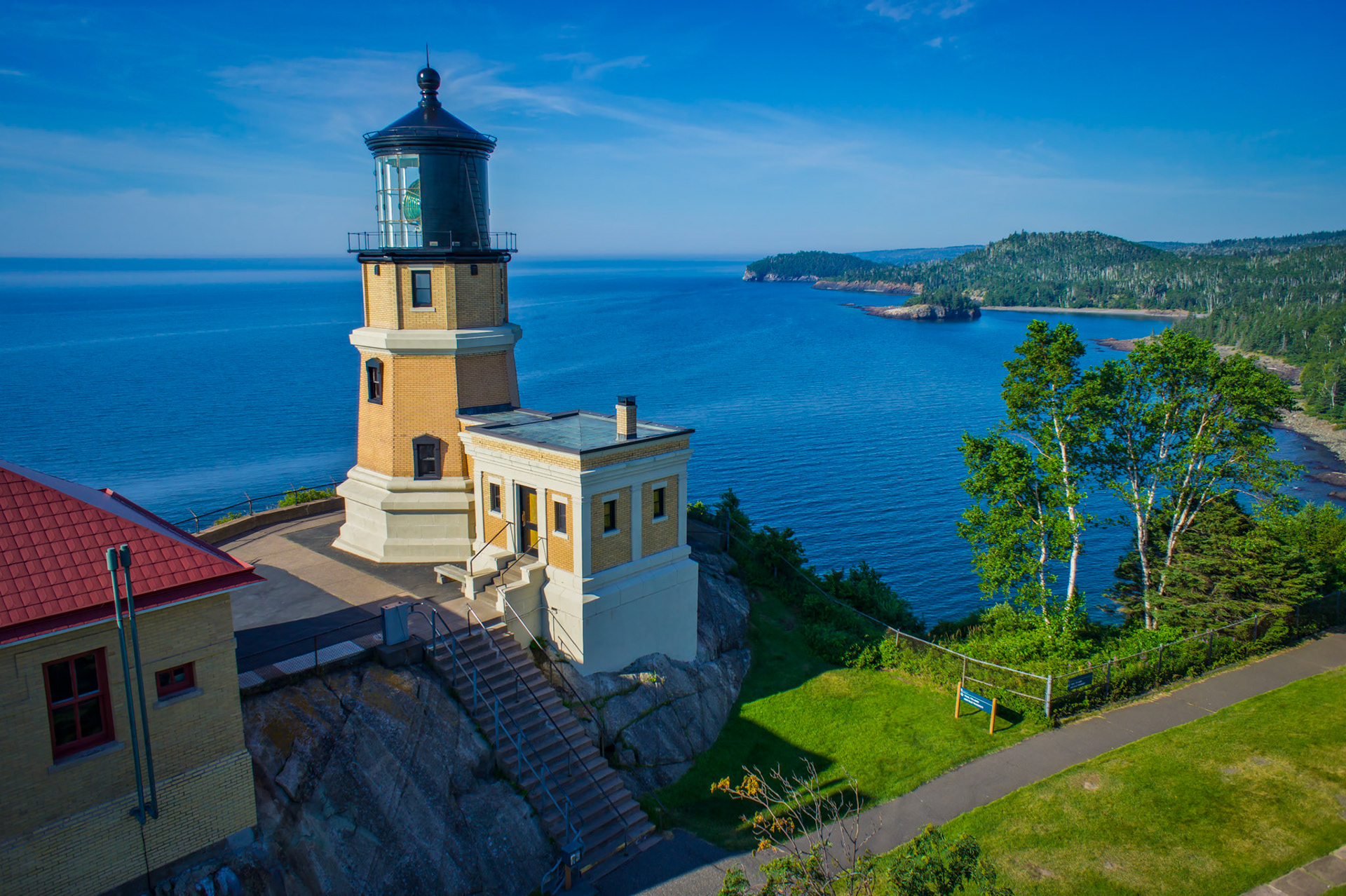August 5th - Summer at Split Rock Lighthouse - This majestic lighthouse stands watch over the North Shore of Lake Superior and has been a symbol of strength and fortitude for 110 years.The keepers faithfully ensured the light shone over the waters of Lake Superior, guiding ships to safety and refuge. Split Rock Lighthouse sits on a foundation of immovable rock.Just as this mighty light stands on a rock, Jesus is our foundation in this world. We can put our faith in Him alone.The LORD is my rock and my fortress and my deliverer;My God, my strength, in whom I will trust;My shield and the horn of my salvation, my stronghold. Psalm 18:2