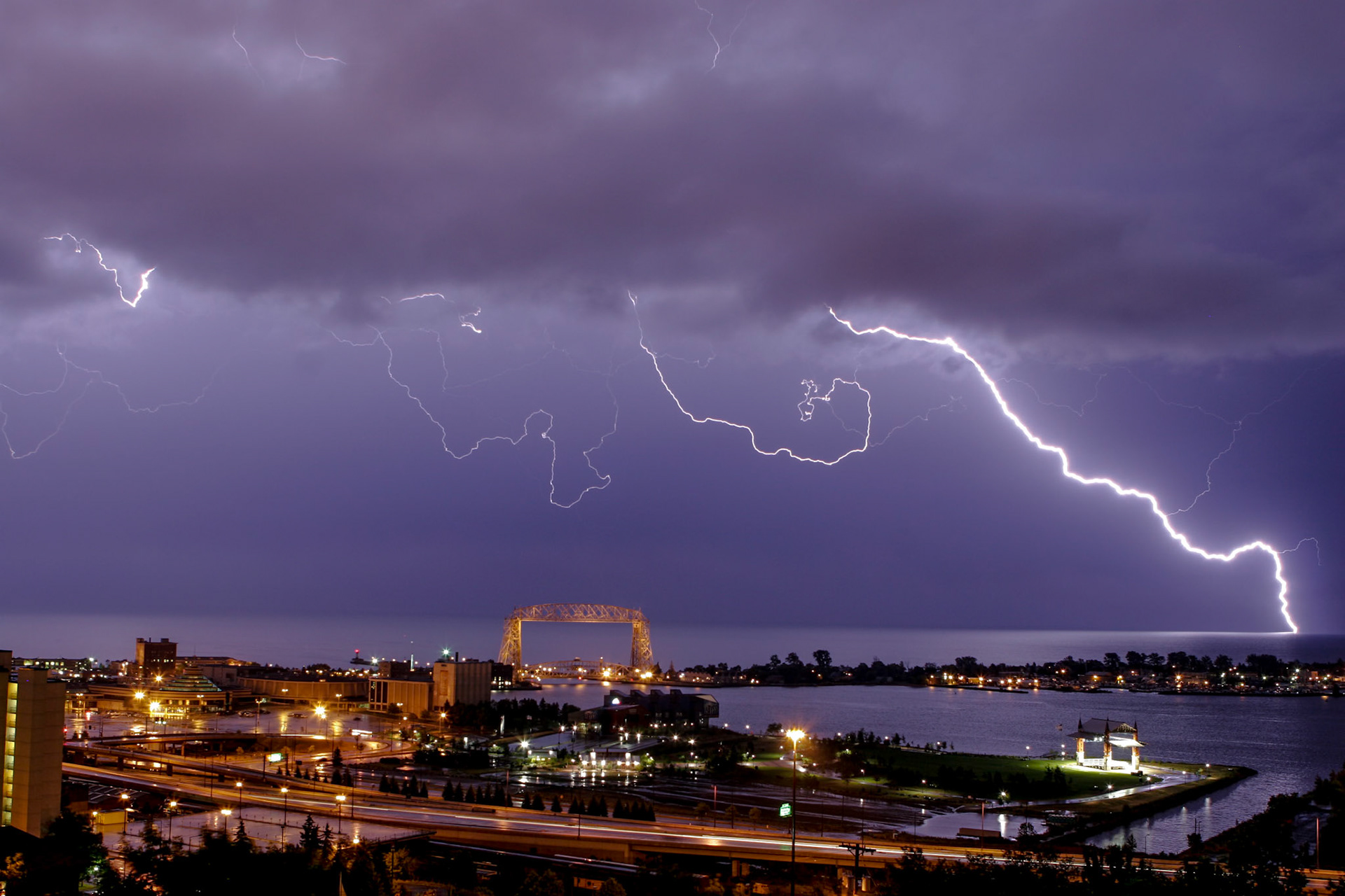 The power Lightning over Lake Superior as viewed from the Duluth Hillside. One lightning strike can carry enough electricity to power 10 million homes for one month.