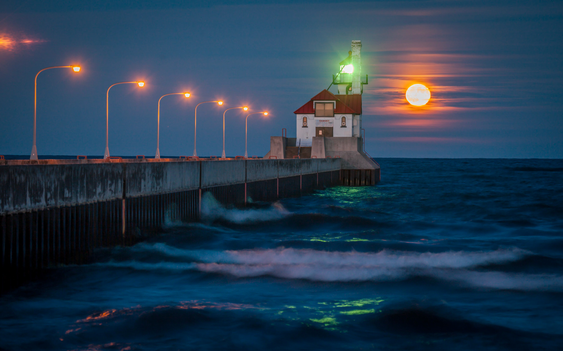 October 30 - October Full Moon Rising The October "Hunter's Moon" rising behind the Duluth South Pier Lighthouse creates an incredible late-October scene.Like clockwork, the moon rose on schedule at its appointed place.It is amazing to observe the hand of God spinning the galaxies, stars, and moon in precise timing to show us who he is at any time of year.He made the moon to mark the seasons; the sun knows its time for setting. Psalm 104:19