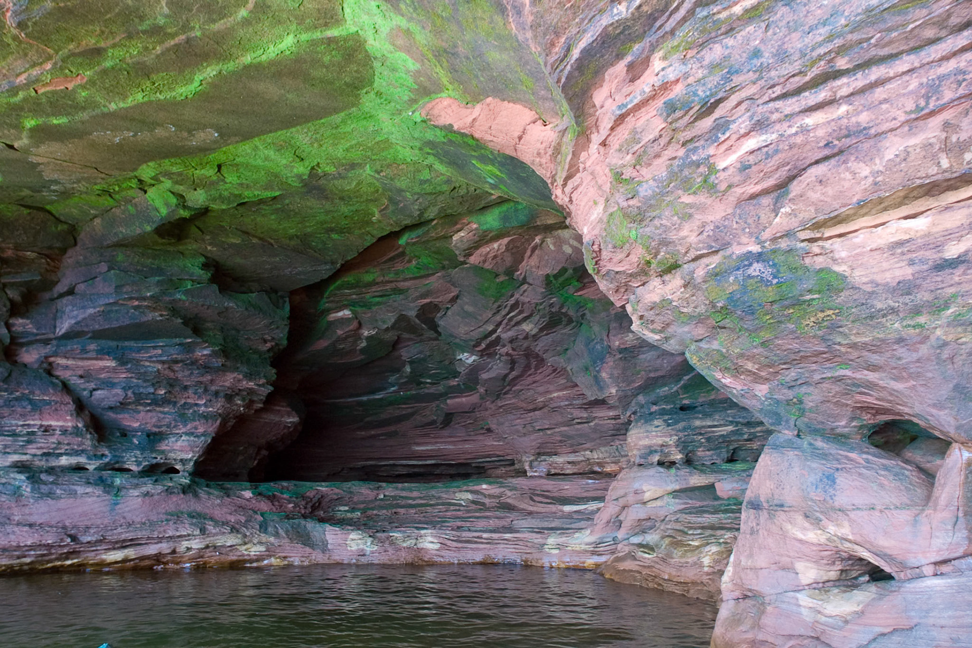 The Apostle Islands sit just off shore from the Bayfield Peninsula on Lake Superior. Erosion of the sandstone has carved out sea caves which can be visited by boat during the summer, and on skies during colder winters. The caves are one of the wonders of the region and give new meaning to "Heaven on Earth".