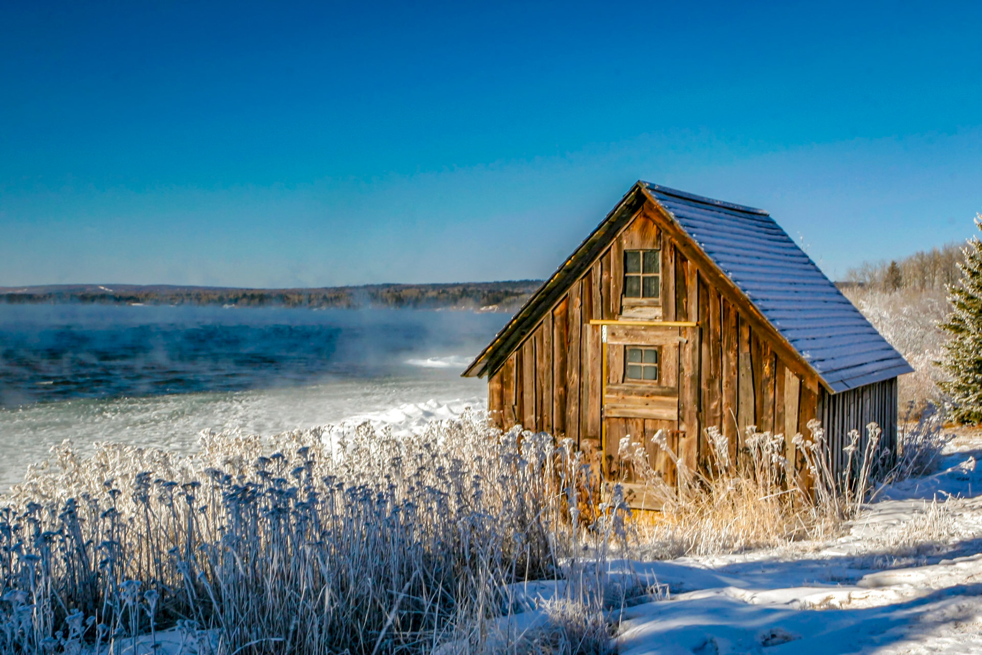 February 18 - Jack Frost's CabinThis fishing shanty, located at Stony Point, was built to support the thriving fishing industry on the North Shore at the time. This rugged structure protects the nets and other tools that fishermen rely on, even during the fiercest storms. It's a quiet little survivor of North Shore working history — part fishing shelter, part weather station, part time capsule.There are many of these old shacks along the North Shore, and all have a story to tell. One of the strengths, fortitude, and persistence of the fishermen who made a living from the big lake. They had no idea it would become a photography attraction years later. Life was very hard for these families as they lived through seasons that are now gone. "Therefore, I tell you, do not be anxious about your life, what you will eat or what you will drink, nor about your body, what you will put on. Isn't life more than food and the body more than clothing? Look at the birds of the air: they neither sow nor reap nor gather into barns, yet your heavenly Father feeds them. Are you not of more value than they? And which of you, by being anxious, can add a single hour to his span of life?  -  Matthew 6:25-27God's provision is one of His mighty attributes, for which we can be thankful daily! How will you live your next season of life?