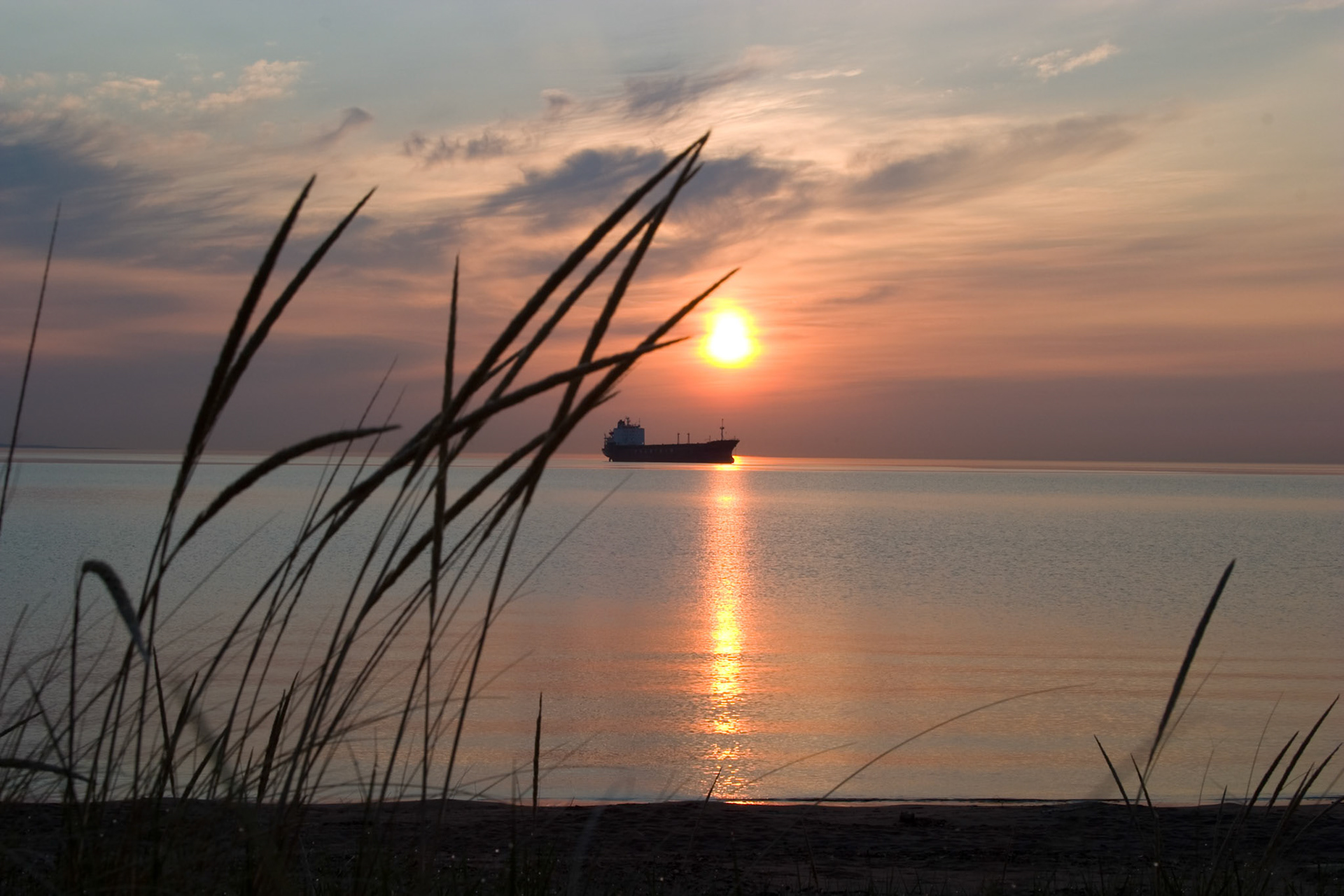 A freighter waits in Lake Superior to pick up grain in Duluth.