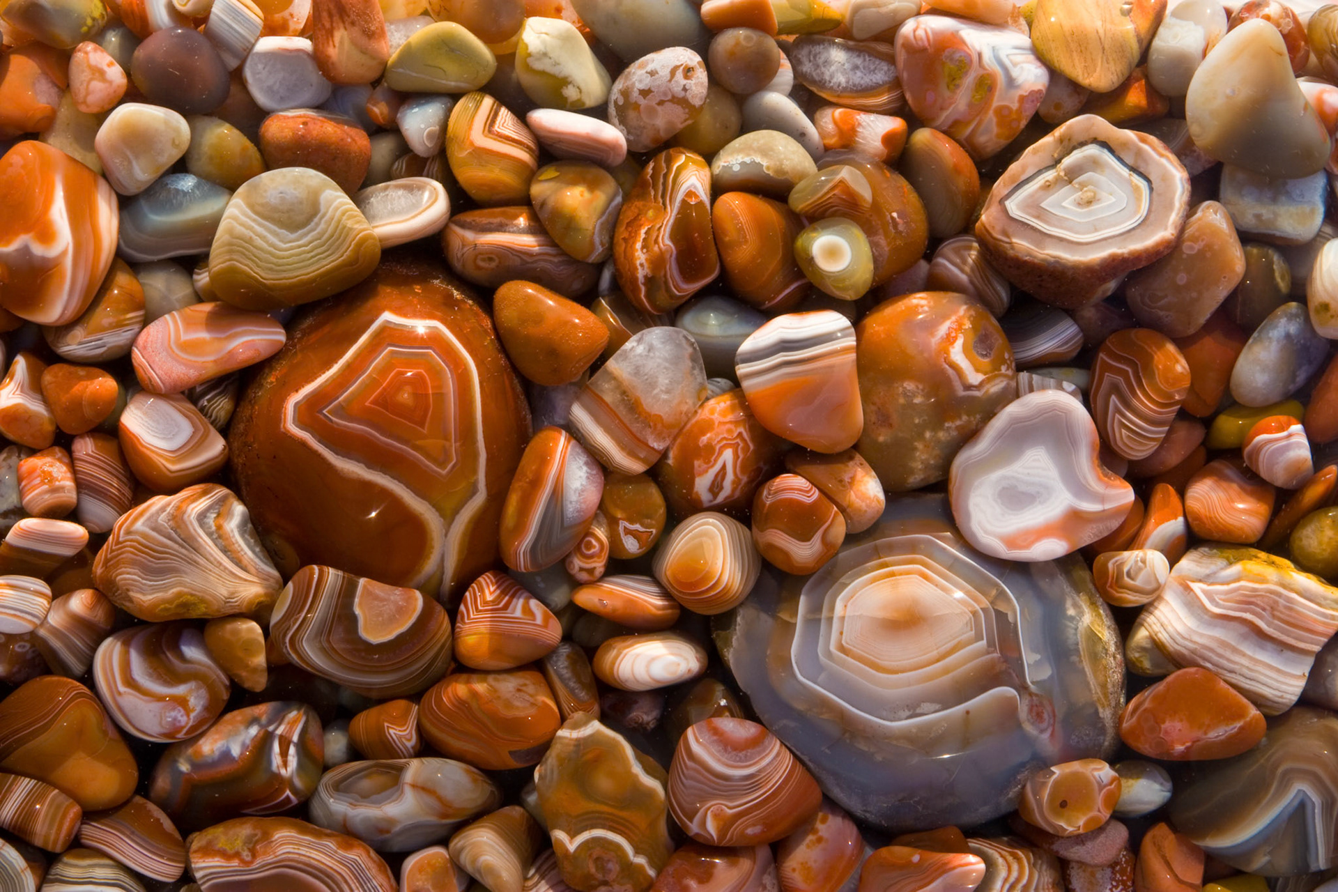 The Lake Superior Agate is Minnesota's State Gem. It is a type of agate stained by iron and found on the shores of Lake Superior. The gemstone comes in various sizes. The gas pockets in which the agates formed were primarily small, about the size of a pea. A few Lake Superior agates weigh more than 20 pounds, about the size of a bowling ball. Such giant agates are extremely rare, but no doubt others are yet to be discovered.