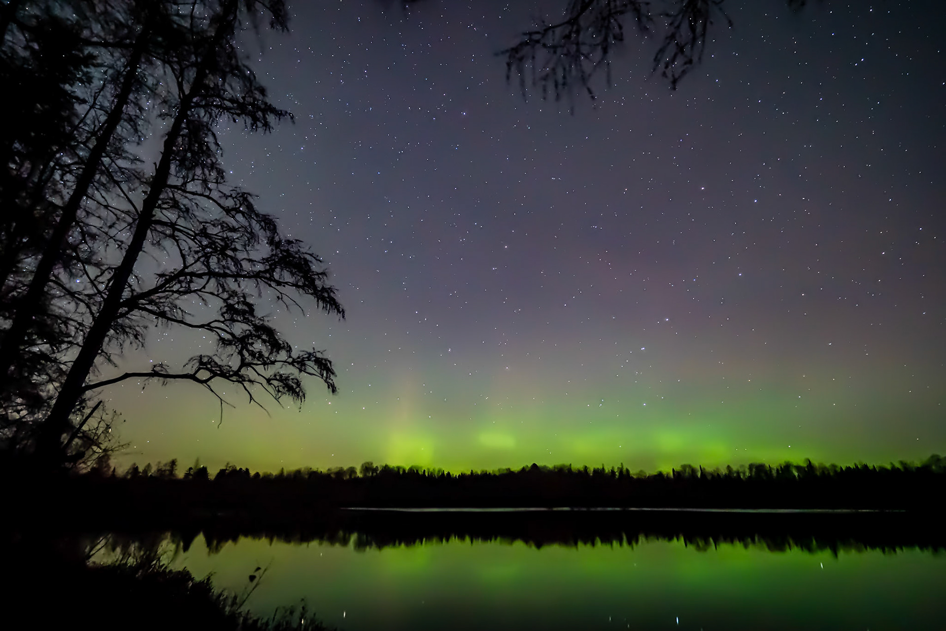October 28 - Aurora GlowStars shine through the Northern Lights on a warm October night as they reflect onto the calm waters of a northern lake.With the longer night of October, the lights are easy to see, even during early evening hours.With the calm winds, you can hear the melody of the local wolf pack howling to listen to the echo on the distant ridges.And God said, “Let there be lights in the expanse of the heavens to separate the day from the night. And let them be for signs and for seasons, and for days and years, Genesis 1:14