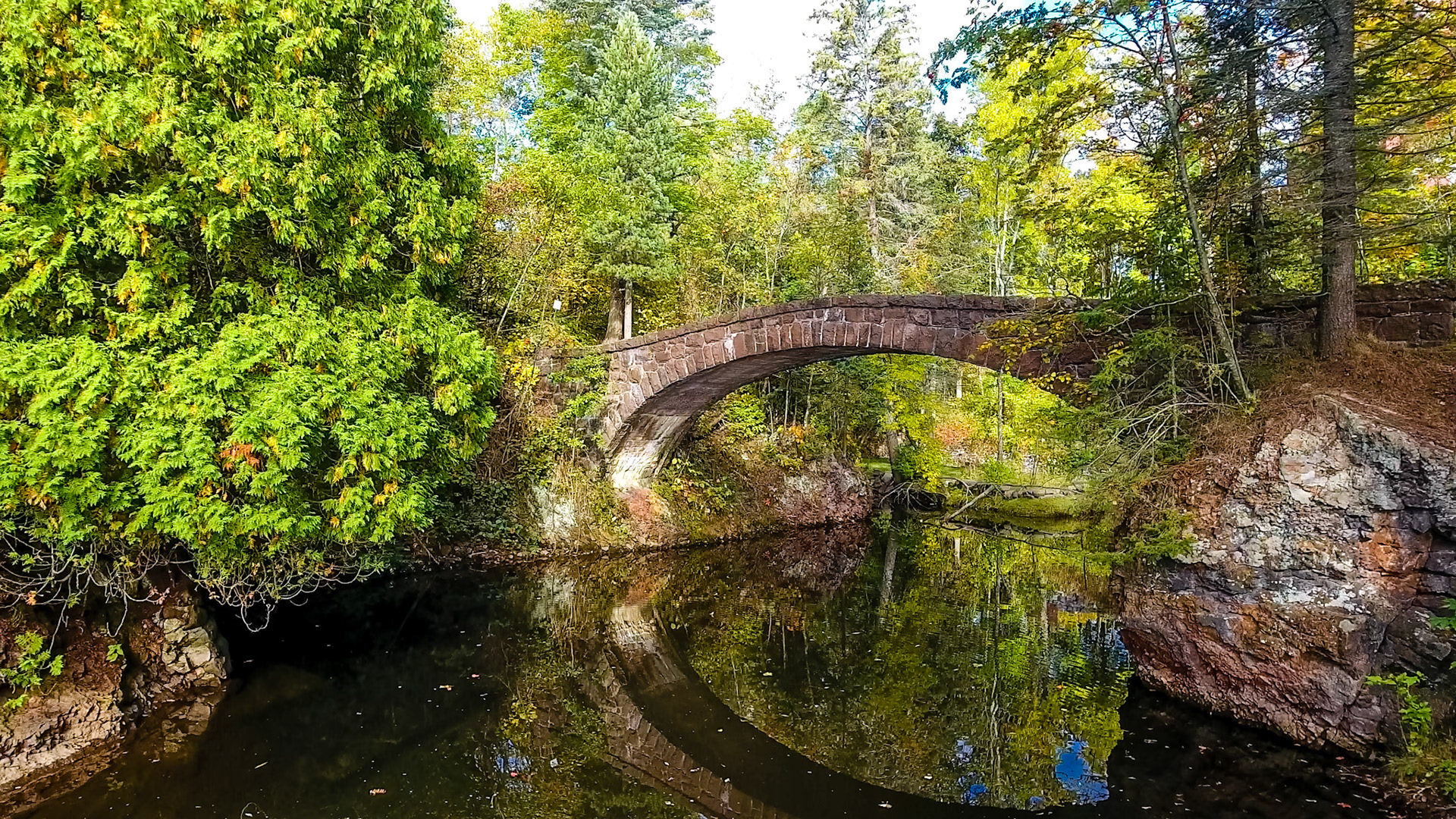 Hidden away on the grounds of the historic Glensheen Estate, the stone bridge that crosses over Tishere Creek is a testament to the workmanship of the stone masons who built it in 1905.