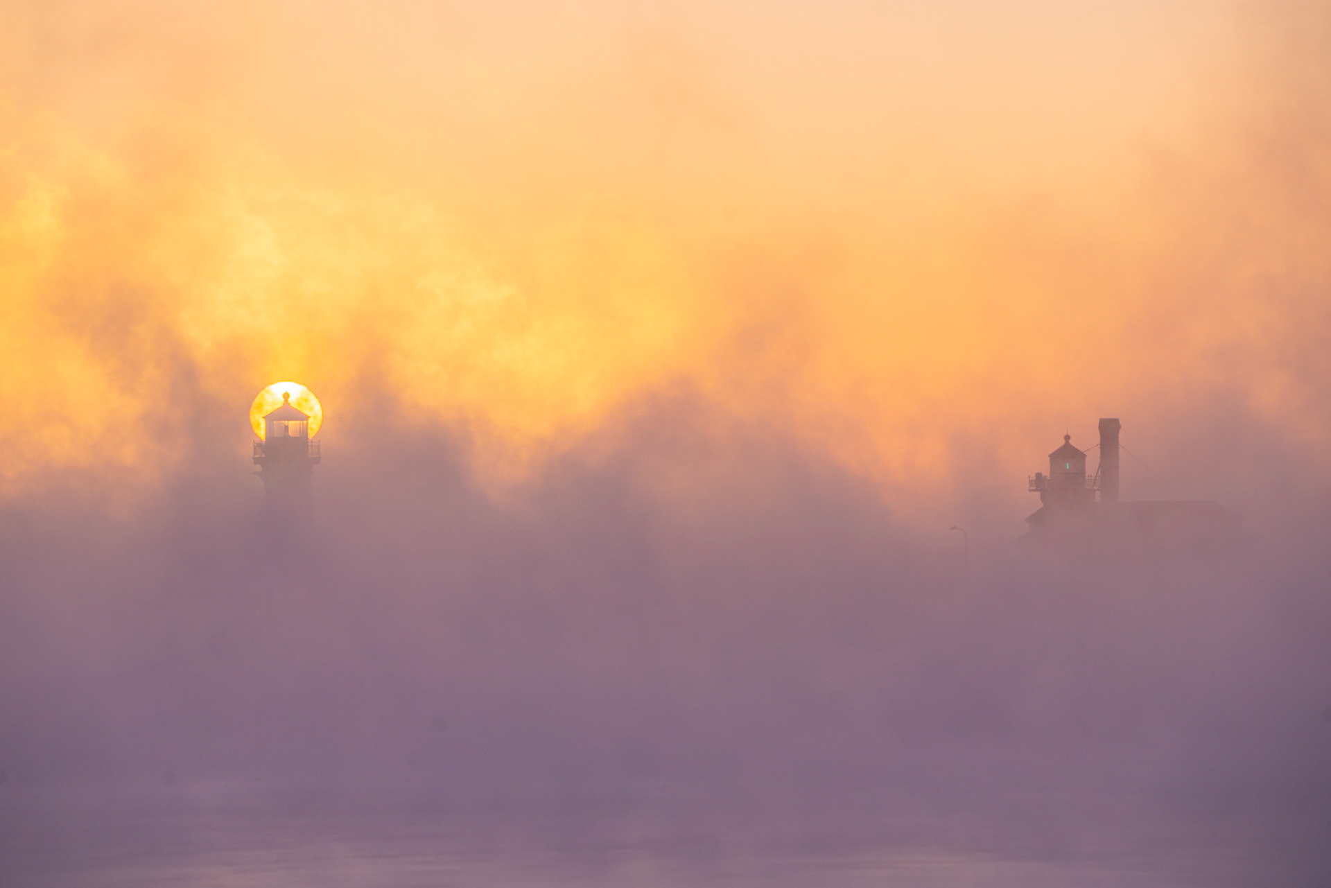 December 13th - Lighthouses in the Seas Smoke On a frigid December morning, the sun rises behind the North Pier Lighthouse in Duluth.Yet you do not know what tomorrow will bring. What is your life? For you are a mist that appears for a little time and then vanishes. James 4:14