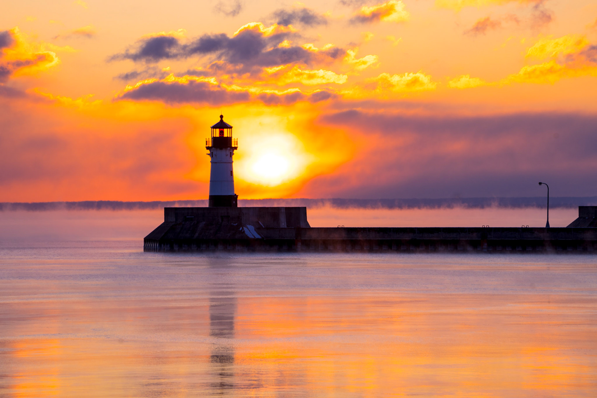 December 1 - A perfect Lake Superior Sunrise welcomes the day.The fresh, moist air, golden sunrise, and chorus of local gulls make for a perfect start to the day."The steadfast love of the Lord never ceases; his mercies never come to an end; they are new every morning; great is your faithfulness." - Lamentations 3:22-23