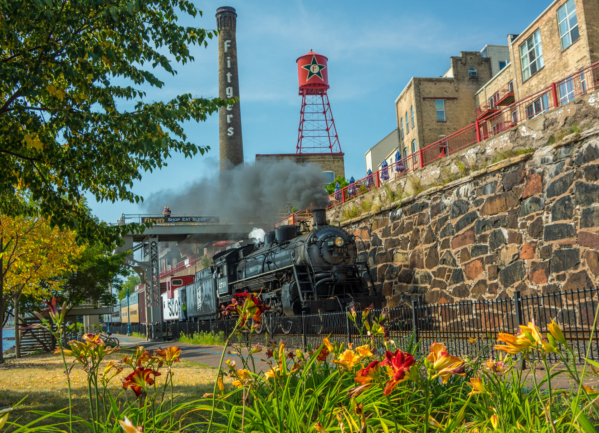 August 23rd—History—The historic 2719 Locomotive travels the North Shore Scenic Railroad near Fitger's Inn in Duluth.This historic locomotive, a symbol of progress and ambition, stands as a proud reminder of a bygone era, when the Northland was on the cusp of a transformative growth and expansion."To those who use well what they are given, even more will be given, and they will have an abundance. But from those who do nothing, even what little they have will be taken away." - Matthew 25:29Use the past to motivate the future, as we will be here only briefly.