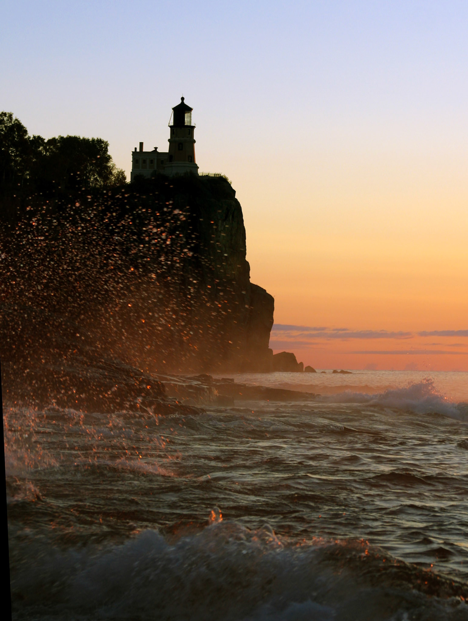 The golden light of a Superior Morning breaks across the waters of Lake Superior.