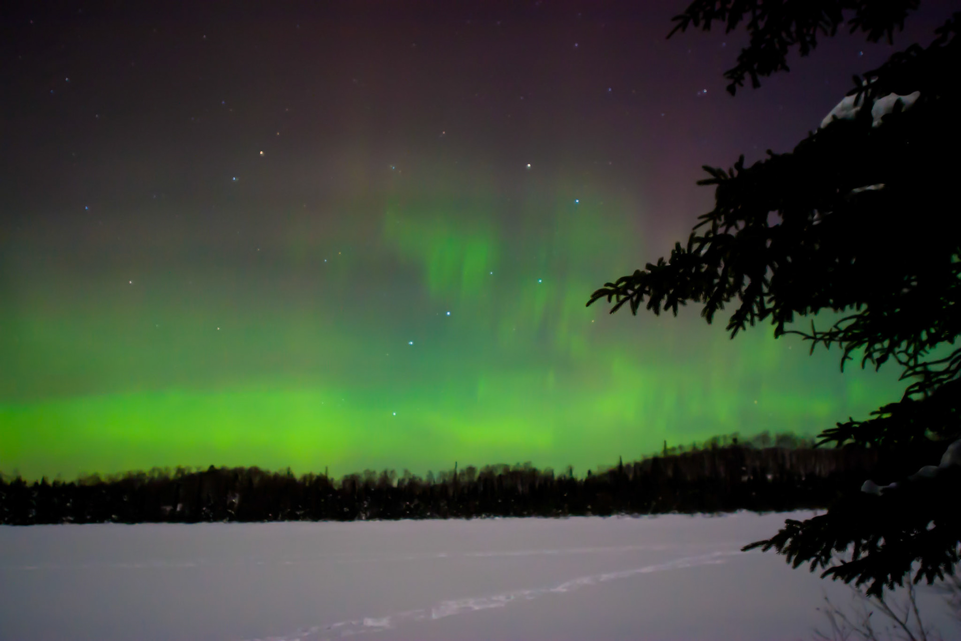 January 18 - The Big Dipper in the AurorasThe Aurora Borealis flicked to life in the night skies above a snow-covered landscape. The calm winds and silent forest added to The Northern Light's mystique on this sub-zero January evening.The mix of landscape, skies, and stars combine to declare the glory of God in this January scenery in the northern forest."Yours is the day, Yours also the night; You have established the heavenly lights and the sun. You have fixed all the boundaries of the earth; You have made summer and winter." (Psalm 74:16-17) It is humbling to know that God is at work, painting the sky for an audience of one. We only have to "look up" and see him through His creation as He looks down to give peace to our souls.