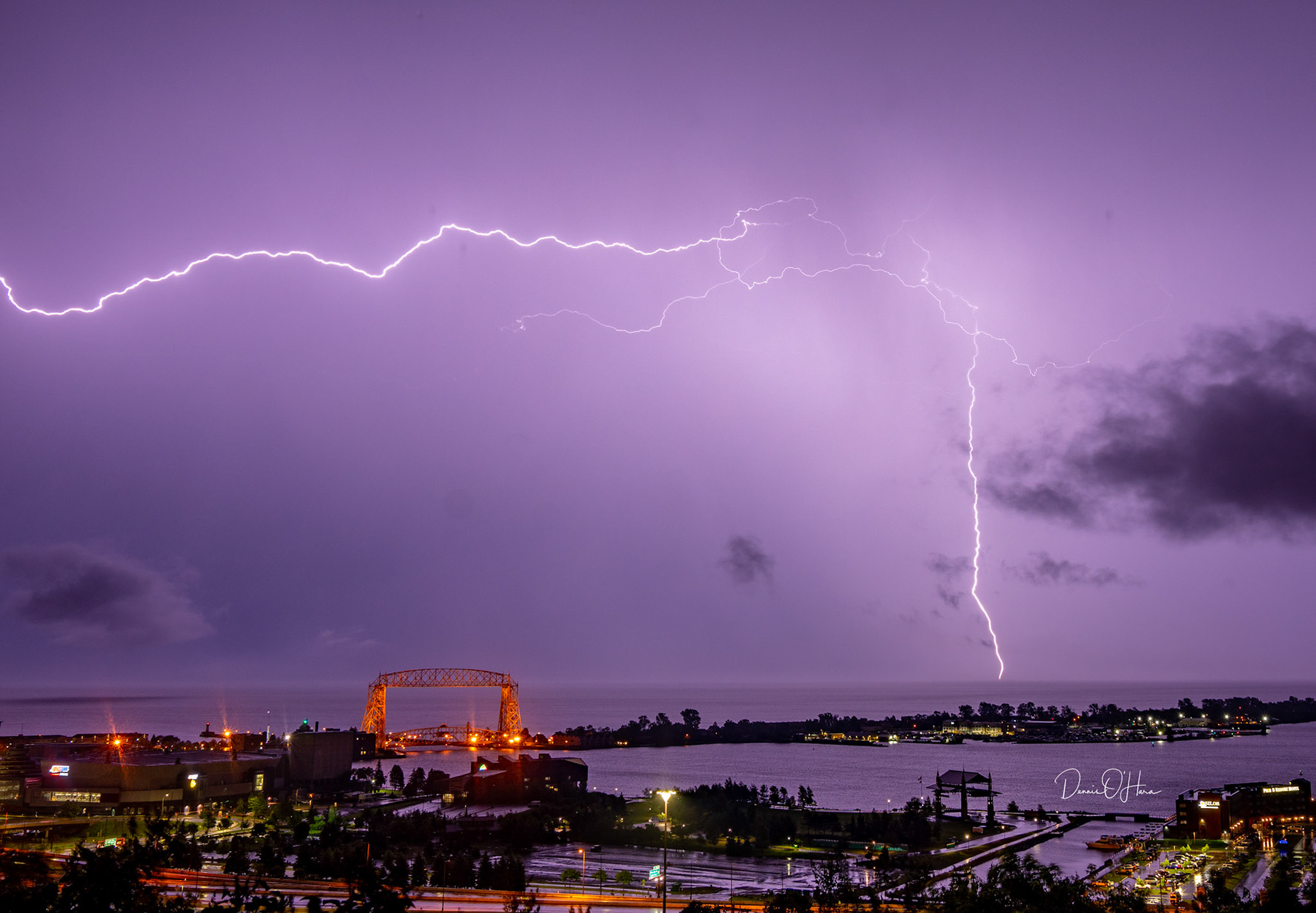July 12 - Lake Lightning  Lightning storms frequent the Northland in the warm July atmosphere and create stunning lighting displays.This storm took several hours to pass by and woke most residents with the light show and thunder. The voice of thy thunder was in the heaven: the lightnings lightened the world: the earth trembled and shook.  Psalms 77:18