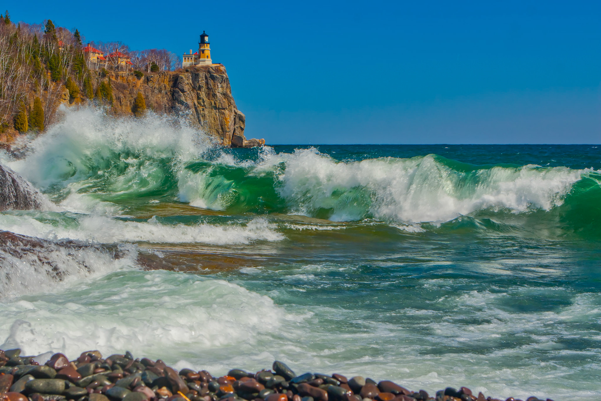 April 7 - Split Rock SeascapeLake Superior kicks up some waves at Split Rock Beach.While it is still only April, the shoreline around Lake Superior shows its beauty in a summer-like fashion.You rule the raging of the sea; when its waves rise, you still them. Psalm 89:9The Power of God is evident in all that surrounds us.