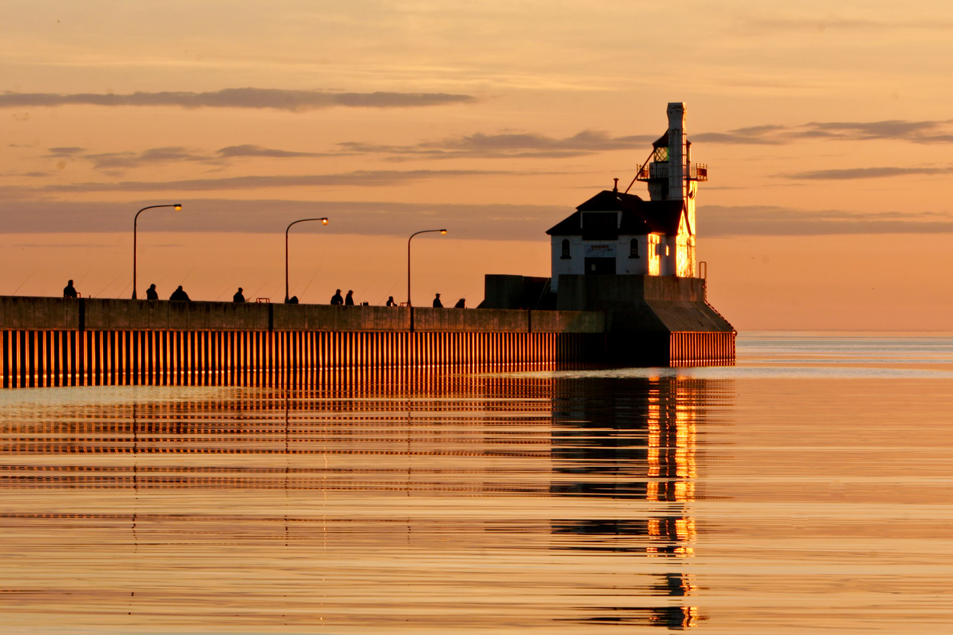 Fishermen gather to try their luck at catching lake trout from the piers of the Duluth Shipping Canal.